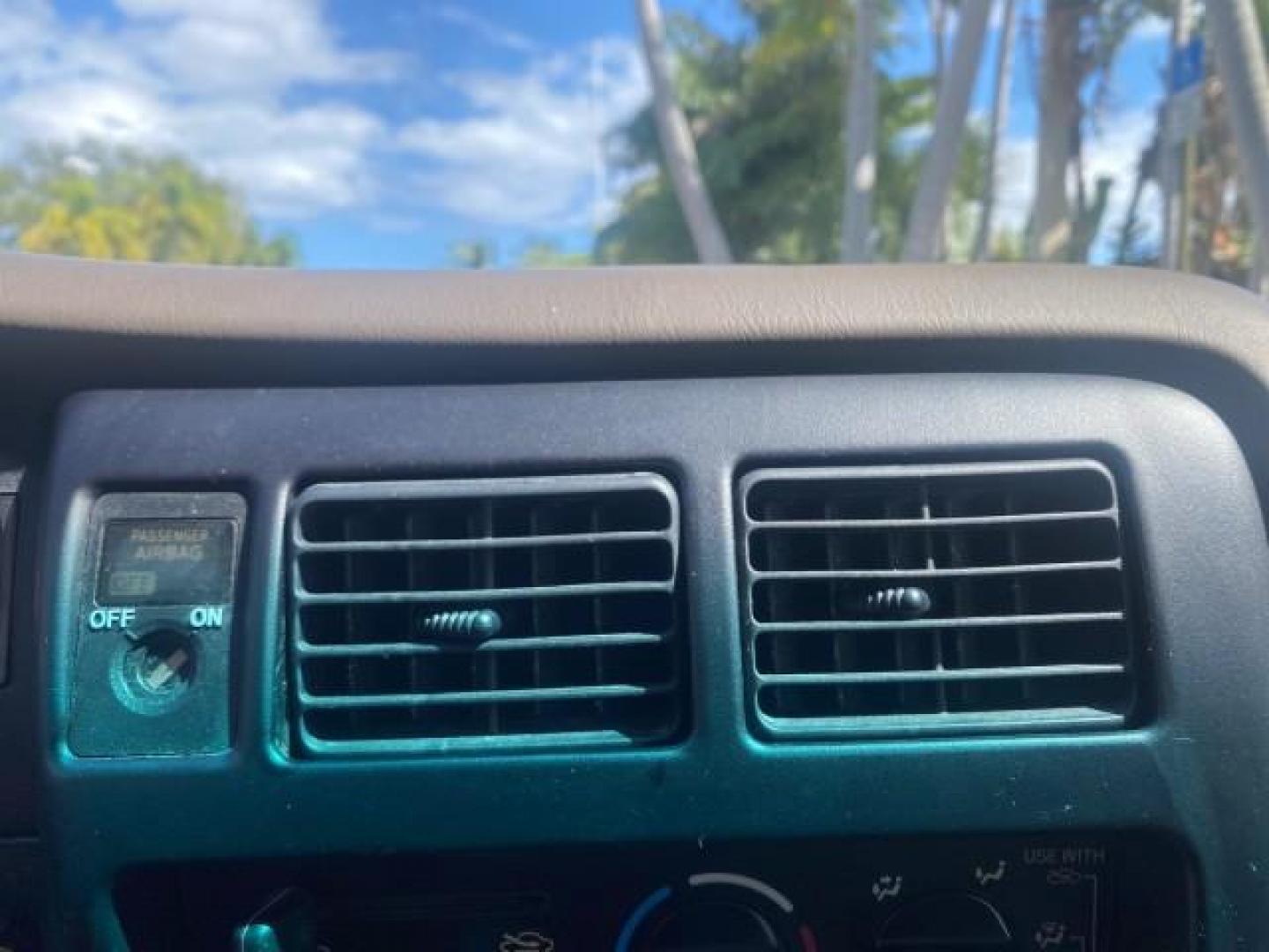 2000 Black Sand Pearl /Oak Toyota Tacoma LOW MILES 74,047 1 OWNER (4TAVL52N2YZ) with an 2.4L DOHC EFI 16-Valve I4 Engine engine, Automatic transmission, located at 4701 North Dixie Hwy, Pompano Beach, FL, 33064, (954) 422-2889, 26.240938, -80.123474 - OUR WEBPAGE FLORIDACARS1.COM HAS OVER 100 PHOTOS AND FREE CARFAX LINK 2000 TOYOTA TACOMA SR5 VIN: 4TAVL52N2YZ618796 4 T A V L 5 2 N 2 Y Z 6 1 8 7 9 6 CLUB CAB PICKUP 2.4L I4 F DOHC GASOLINE 29 MPG REAR WHEEL DRIVE Features Air Conditioning AM/FM Stereo Automatic Transmission Bed Liner Cassette Playe - Photo#60