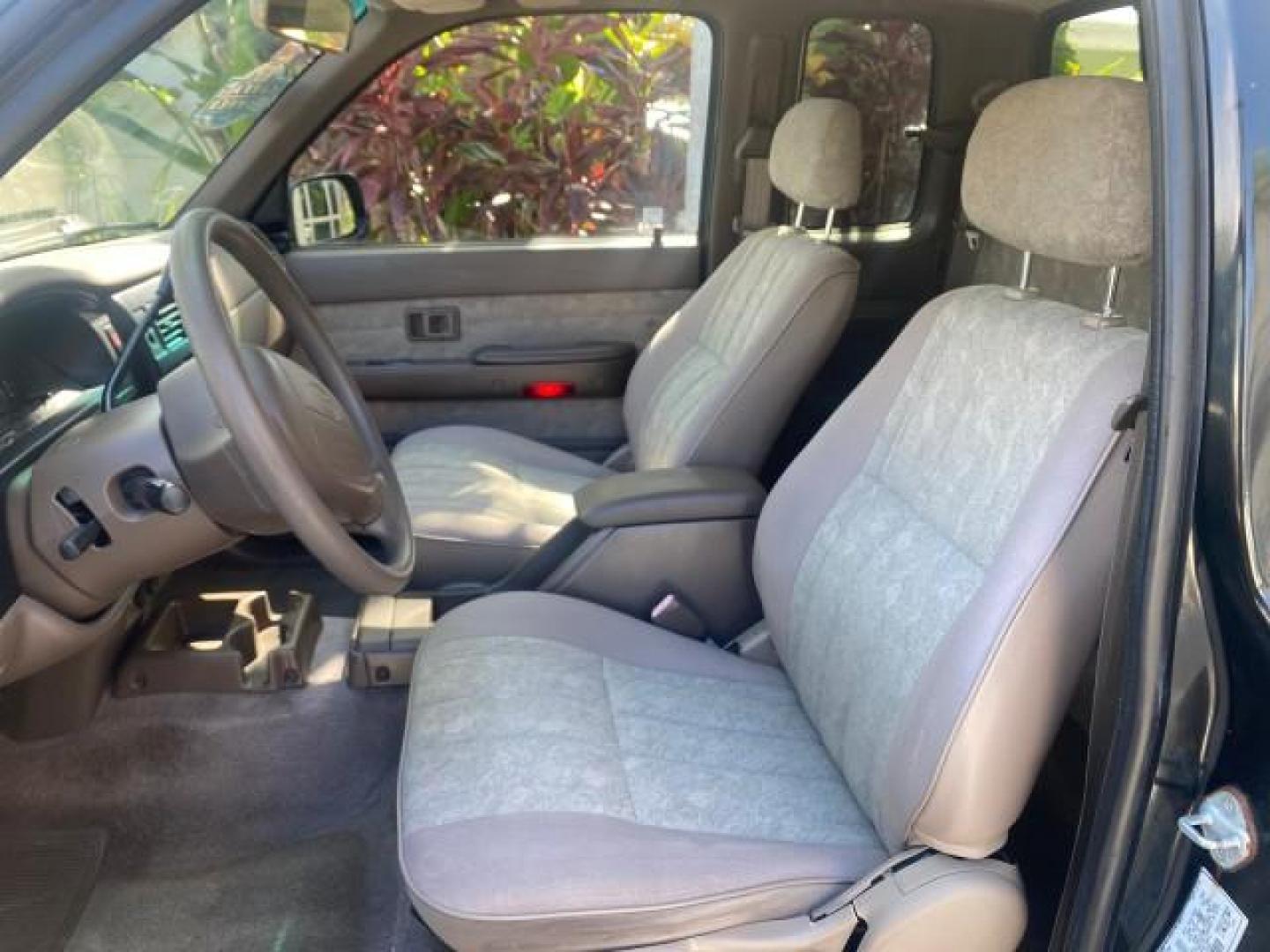 2000 Black Sand Pearl /Oak Toyota Tacoma LOW MILES 74,047 1 OWNER (4TAVL52N2YZ) with an 2.4L DOHC EFI 16-Valve I4 Engine engine, Automatic transmission, located at 4701 North Dixie Hwy, Pompano Beach, FL, 33064, (954) 422-2889, 26.240938, -80.123474 - OUR WEBPAGE FLORIDACARS1.COM HAS OVER 100 PHOTOS AND FREE CARFAX LINK 2000 TOYOTA TACOMA SR5 VIN: 4TAVL52N2YZ618796 4 T A V L 5 2 N 2 Y Z 6 1 8 7 9 6 CLUB CAB PICKUP 2.4L I4 F DOHC GASOLINE 29 MPG REAR WHEEL DRIVE Features Air Conditioning AM/FM Stereo Automatic Transmission Bed Liner Cassette Playe - Photo#78