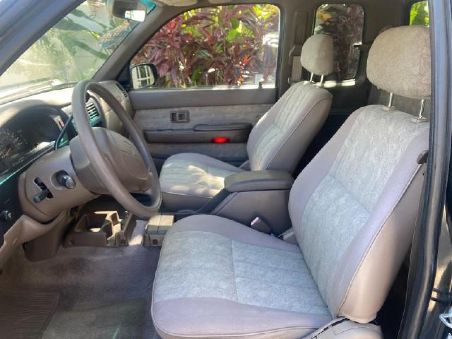 2000 Black Sand Pearl /Oak Toyota Tacoma LOW MILES 74,047 1 OWNER (4TAVL52N2YZ) with an 2.4L DOHC EFI 16-Valve I4 Engine engine, Automatic transmission, located at 4701 North Dixie Hwy, Pompano Beach, FL, 33064, (954) 422-2889, 26.240938, -80.123474 - OUR WEBPAGE FLORIDACARS1.COM HAS OVER 100 PHOTOS AND FREE CARFAX LINK 2000 TOYOTA TACOMA SR5 VIN: 4TAVL52N2YZ618796 4 T A V L 5 2 N 2 Y Z 6 1 8 7 9 6 CLUB CAB PICKUP 2.4L I4 F DOHC GASOLINE 29 MPG REAR WHEEL DRIVE Features Air Conditioning AM/FM Stereo Automatic Transmission Bed Liner Cassette Playe - Photo#79