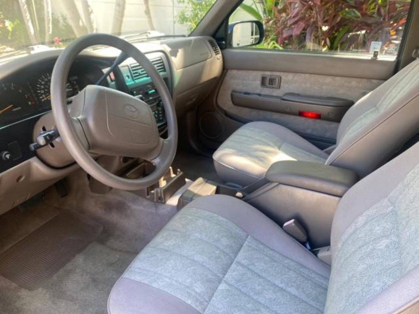 2000 Black Sand Pearl /Oak Toyota Tacoma LOW MILES 74,047 1 OWNER (4TAVL52N2YZ) with an 2.4L DOHC EFI 16-Valve I4 Engine engine, Automatic transmission, located at 4701 North Dixie Hwy, Pompano Beach, FL, 33064, (954) 422-2889, 26.240938, -80.123474 - OUR WEBPAGE FLORIDACARS1.COM HAS OVER 100 PHOTOS AND FREE CARFAX LINK 2000 TOYOTA TACOMA SR5 VIN: 4TAVL52N2YZ618796 4 T A V L 5 2 N 2 Y Z 6 1 8 7 9 6 CLUB CAB PICKUP 2.4L I4 F DOHC GASOLINE 29 MPG REAR WHEEL DRIVE Features Air Conditioning AM/FM Stereo Automatic Transmission Bed Liner Cassette Playe - Photo#81