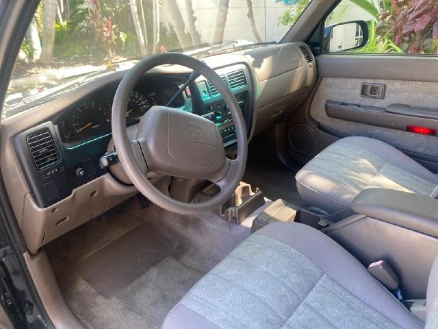 2000 Black Sand Pearl /Oak Toyota Tacoma LOW MILES 74,047 1 OWNER (4TAVL52N2YZ) with an 2.4L DOHC EFI 16-Valve I4 Engine engine, Automatic transmission, located at 4701 North Dixie Hwy, Pompano Beach, FL, 33064, (954) 422-2889, 26.240938, -80.123474 - OUR WEBPAGE FLORIDACARS1.COM HAS OVER 100 PHOTOS AND FREE CARFAX LINK 2000 TOYOTA TACOMA SR5 VIN: 4TAVL52N2YZ618796 4 T A V L 5 2 N 2 Y Z 6 1 8 7 9 6 CLUB CAB PICKUP 2.4L I4 F DOHC GASOLINE 29 MPG REAR WHEEL DRIVE Features Air Conditioning AM/FM Stereo Automatic Transmission Bed Liner Cassette Playe - Photo#83