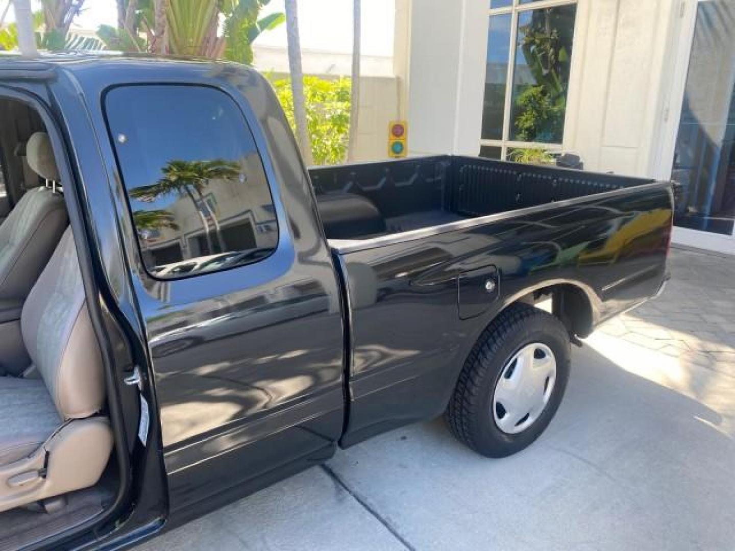 2000 Black Sand Pearl /Oak Toyota Tacoma LOW MILES 74,047 1 OWNER (4TAVL52N2YZ) with an 2.4L DOHC EFI 16-Valve I4 Engine engine, Automatic transmission, located at 4701 North Dixie Hwy, Pompano Beach, FL, 33064, (954) 422-2889, 26.240938, -80.123474 - OUR WEBPAGE FLORIDACARS1.COM HAS OVER 100 PHOTOS AND FREE CARFAX LINK 2000 TOYOTA TACOMA SR5 VIN: 4TAVL52N2YZ618796 4 T A V L 5 2 N 2 Y Z 6 1 8 7 9 6 CLUB CAB PICKUP 2.4L I4 F DOHC GASOLINE 29 MPG REAR WHEEL DRIVE Features Air Conditioning AM/FM Stereo Automatic Transmission Bed Liner Cassette Playe - Photo#84