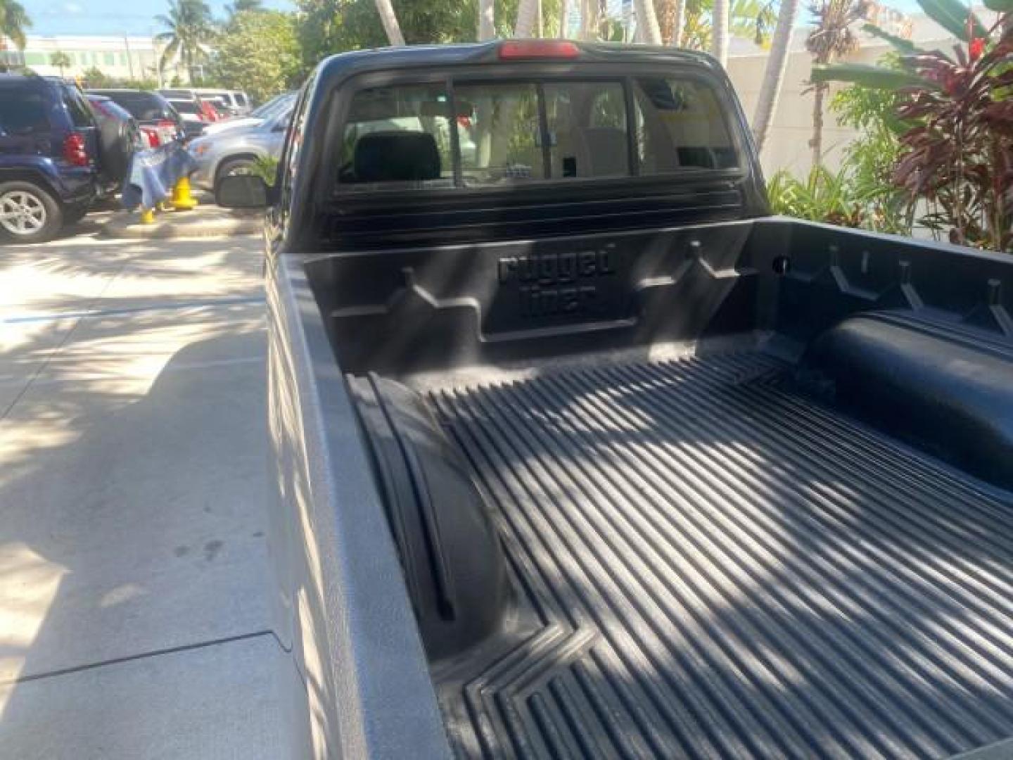 2000 Black Sand Pearl /Oak Toyota Tacoma LOW MILES 74,047 1 OWNER (4TAVL52N2YZ) with an 2.4L DOHC EFI 16-Valve I4 Engine engine, Automatic transmission, located at 4701 North Dixie Hwy, Pompano Beach, FL, 33064, (954) 422-2889, 26.240938, -80.123474 - OUR WEBPAGE FLORIDACARS1.COM HAS OVER 100 PHOTOS AND FREE CARFAX LINK 2000 TOYOTA TACOMA SR5 VIN: 4TAVL52N2YZ618796 4 T A V L 5 2 N 2 Y Z 6 1 8 7 9 6 CLUB CAB PICKUP 2.4L I4 F DOHC GASOLINE 29 MPG REAR WHEEL DRIVE Features Air Conditioning AM/FM Stereo Automatic Transmission Bed Liner Cassette Playe - Photo#91