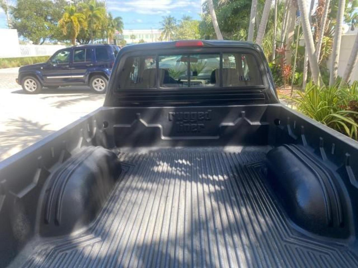 2000 Black Sand Pearl /Oak Toyota Tacoma LOW MILES 74,047 1 OWNER (4TAVL52N2YZ) with an 2.4L DOHC EFI 16-Valve I4 Engine engine, Automatic transmission, located at 4701 North Dixie Hwy, Pompano Beach, FL, 33064, (954) 422-2889, 26.240938, -80.123474 - OUR WEBPAGE FLORIDACARS1.COM HAS OVER 100 PHOTOS AND FREE CARFAX LINK 2000 TOYOTA TACOMA SR5 VIN: 4TAVL52N2YZ618796 4 T A V L 5 2 N 2 Y Z 6 1 8 7 9 6 CLUB CAB PICKUP 2.4L I4 F DOHC GASOLINE 29 MPG REAR WHEEL DRIVE Features Air Conditioning AM/FM Stereo Automatic Transmission Bed Liner Cassette Playe - Photo#93