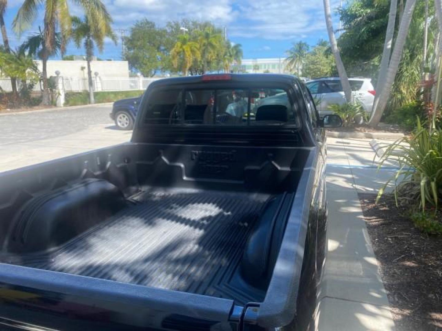 2000 Black Sand Pearl /Oak Toyota Tacoma LOW MILES 74,047 1 OWNER (4TAVL52N2YZ) with an 2.4L DOHC EFI 16-Valve I4 Engine engine, Automatic transmission, located at 4701 North Dixie Hwy, Pompano Beach, FL, 33064, (954) 422-2889, 26.240938, -80.123474 - OUR WEBPAGE FLORIDACARS1.COM HAS OVER 100 PHOTOS AND FREE CARFAX LINK 2000 TOYOTA TACOMA SR5 VIN: 4TAVL52N2YZ618796 4 T A V L 5 2 N 2 Y Z 6 1 8 7 9 6 CLUB CAB PICKUP 2.4L I4 F DOHC GASOLINE 29 MPG REAR WHEEL DRIVE Features Air Conditioning AM/FM Stereo Automatic Transmission Bed Liner Cassette Playe - Photo#94