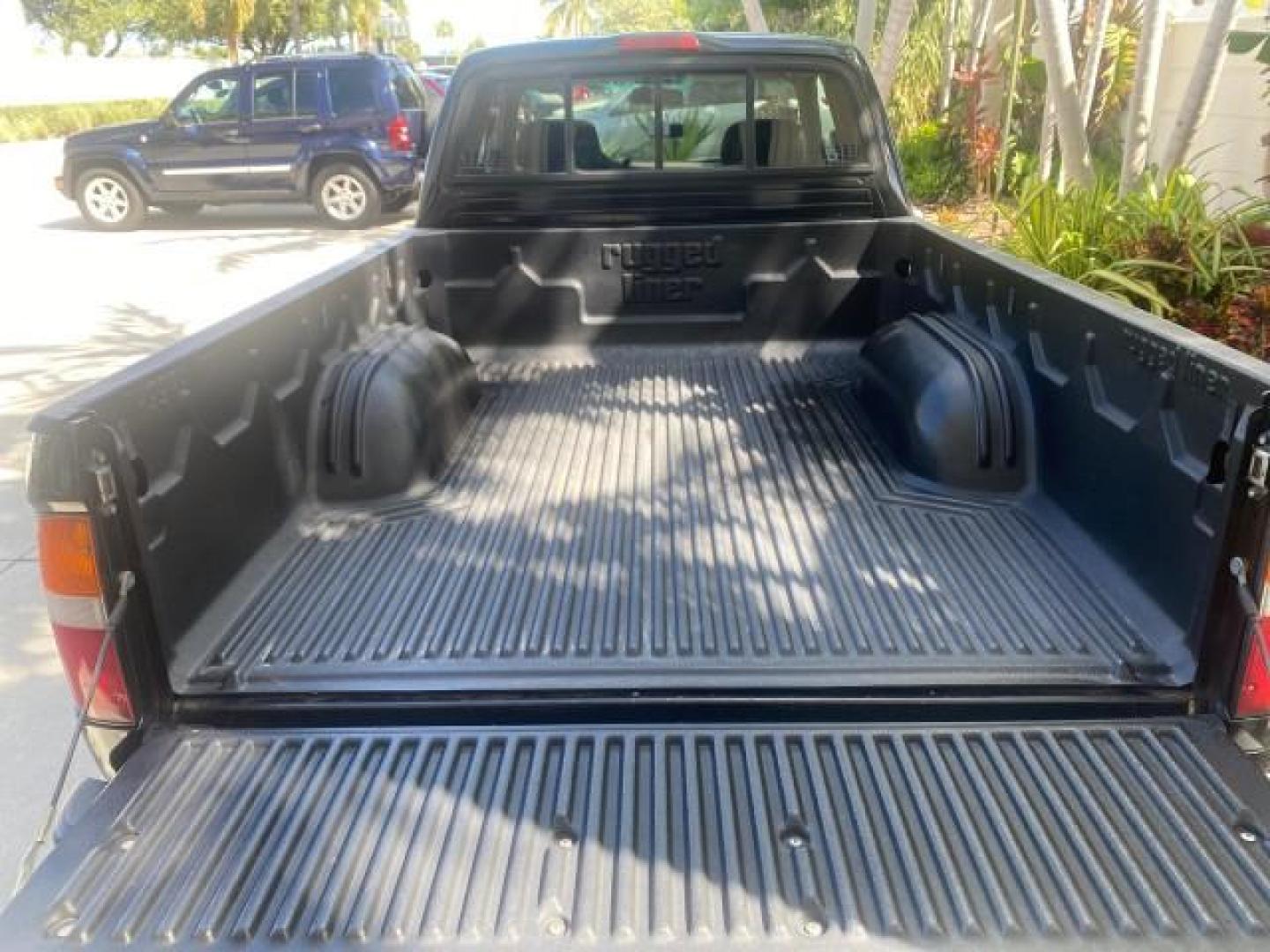 2000 Black Sand Pearl /Oak Toyota Tacoma LOW MILES 74,047 1 OWNER (4TAVL52N2YZ) with an 2.4L DOHC EFI 16-Valve I4 Engine engine, Automatic transmission, located at 4701 North Dixie Hwy, Pompano Beach, FL, 33064, (954) 422-2889, 26.240938, -80.123474 - OUR WEBPAGE FLORIDACARS1.COM HAS OVER 100 PHOTOS AND FREE CARFAX LINK 2000 TOYOTA TACOMA SR5 VIN: 4TAVL52N2YZ618796 4 T A V L 5 2 N 2 Y Z 6 1 8 7 9 6 CLUB CAB PICKUP 2.4L I4 F DOHC GASOLINE 29 MPG REAR WHEEL DRIVE Features Air Conditioning AM/FM Stereo Automatic Transmission Bed Liner Cassette Playe - Photo#95