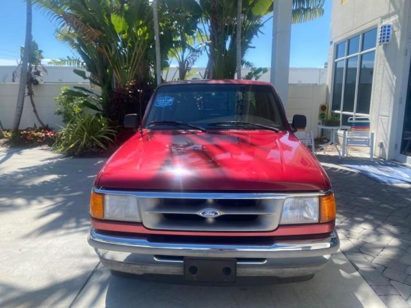1995 Red /Tan Ford Ranger XLT EXTENDED CAB LOW MILES 64,867 (1FTCR14X7ST) with an 4.0L SPFI V6 Engine engine, Automatic transmission, located at 4701 North Dixie Hwy, Pompano Beach, FL, 33064, (954) 422-2889, 26.240938, -80.123474 - OUR WEBPAGE FLORIDACARS1.COM HAS OVER 100 PHOTOS AND FREE CARFAX LINK 1995 FORD RANGER SPLASH EXTENDED CAB - ICE COLD AC VIN: 1FTCR14X7STA40495 1 F T C R 1 4 X 7 S T A 4 0 4 9 5 CLUB CAB PICKUP 4.0L V6 F GASOLINE 29 MPG REAR WHEEL DRIVE Features ABS Brakes Air Conditioning Alloy Wheels AM/FM Stereo - Photo#2