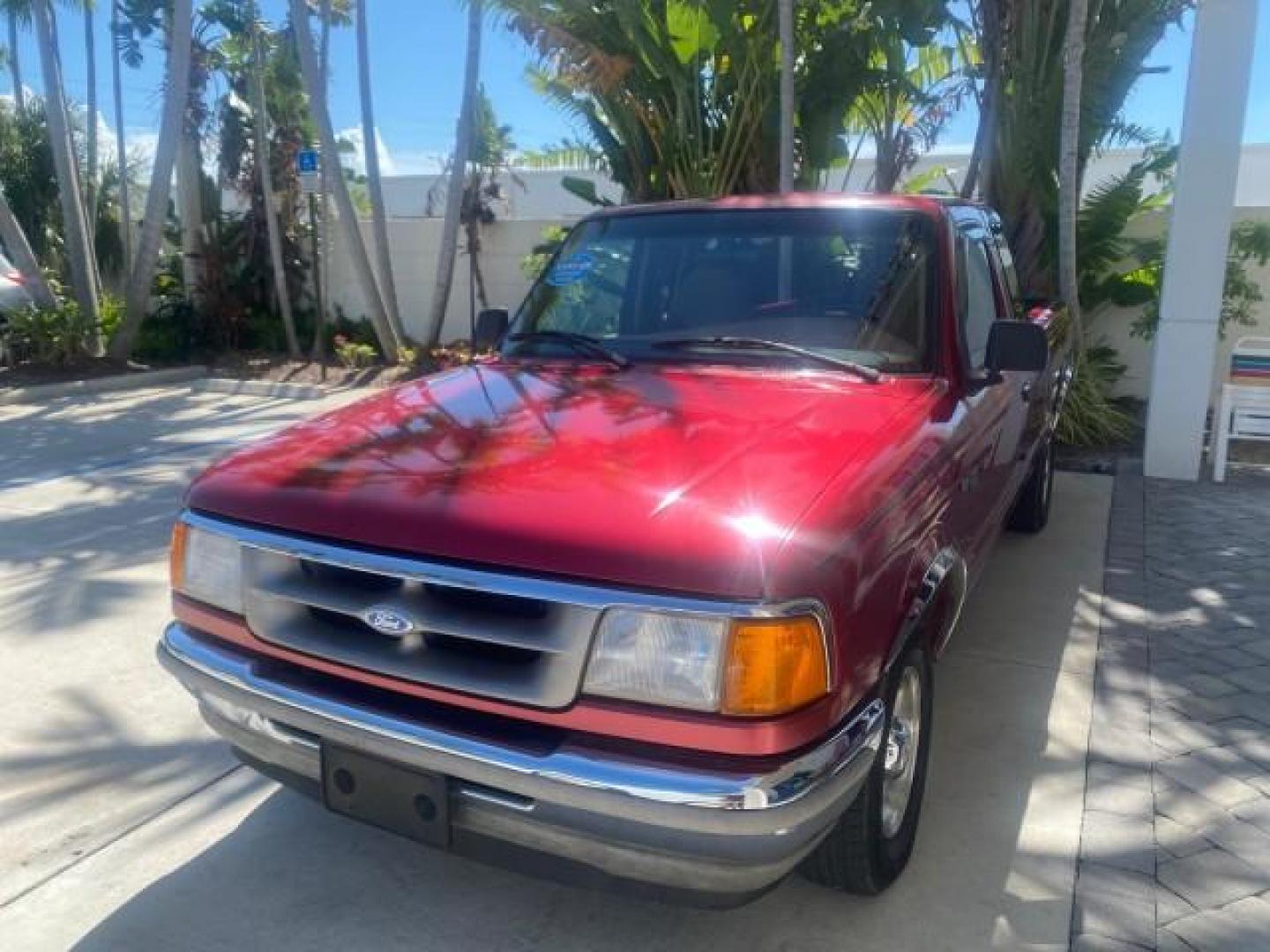1995 Red /Tan Ford Ranger XLT EXTENDED CAB LOW MILES 64,867 (1FTCR14X7ST) with an 4.0L SPFI V6 Engine engine, Automatic transmission, located at 4701 North Dixie Hwy, Pompano Beach, FL, 33064, (954) 422-2889, 26.240938, -80.123474 - OUR WEBPAGE FLORIDACARS1.COM HAS OVER 100 PHOTOS AND FREE CARFAX LINK 1995 FORD RANGER SPLASH EXTENDED CAB - ICE COLD AC VIN: 1FTCR14X7STA40495 1 F T C R 1 4 X 7 S T A 4 0 4 9 5 CLUB CAB PICKUP 4.0L V6 F GASOLINE 29 MPG REAR WHEEL DRIVE Features ABS Brakes Air Conditioning Alloy Wheels AM/FM Stereo - Photo#3