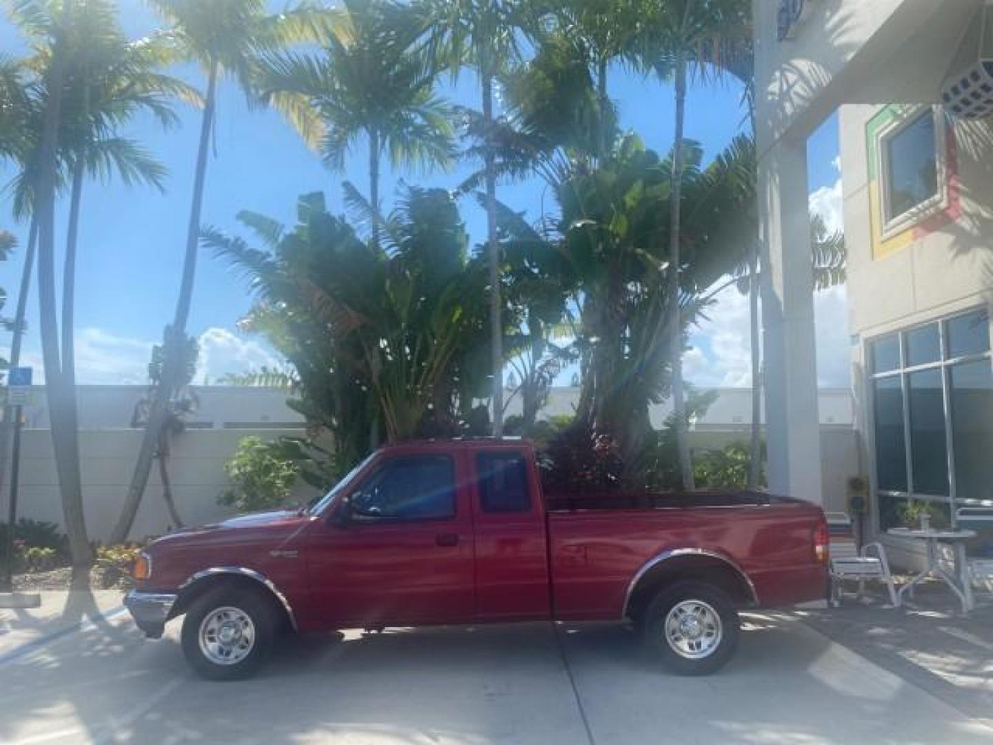 1995 Red /Tan Ford Ranger XLT EXTENDED CAB LOW MILES 64,867 (1FTCR14X7ST) with an 4.0L SPFI V6 Engine engine, Automatic transmission, located at 4701 North Dixie Hwy, Pompano Beach, FL, 33064, (954) 422-2889, 26.240938, -80.123474 - OUR WEBPAGE FLORIDACARS1.COM HAS OVER 100 PHOTOS AND FREE CARFAX LINK 1995 FORD RANGER SPLASH EXTENDED CAB - ICE COLD AC VIN: 1FTCR14X7STA40495 1 F T C R 1 4 X 7 S T A 4 0 4 9 5 CLUB CAB PICKUP 4.0L V6 F GASOLINE 29 MPG REAR WHEEL DRIVE Features ABS Brakes Air Conditioning Alloy Wheels AM/FM Stereo - Photo#4