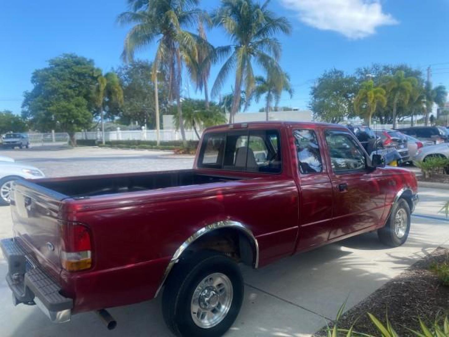 1995 Red /Tan Ford Ranger XLT EXTENDED CAB LOW MILES 64,867 (1FTCR14X7ST) with an 4.0L SPFI V6 Engine engine, Automatic transmission, located at 4701 North Dixie Hwy, Pompano Beach, FL, 33064, (954) 422-2889, 26.240938, -80.123474 - OUR WEBPAGE FLORIDACARS1.COM HAS OVER 100 PHOTOS AND FREE CARFAX LINK 1995 FORD RANGER SPLASH EXTENDED CAB - ICE COLD AC VIN: 1FTCR14X7STA40495 1 F T C R 1 4 X 7 S T A 4 0 4 9 5 CLUB CAB PICKUP 4.0L V6 F GASOLINE 29 MPG REAR WHEEL DRIVE Features ABS Brakes Air Conditioning Alloy Wheels AM/FM Stereo - Photo#7