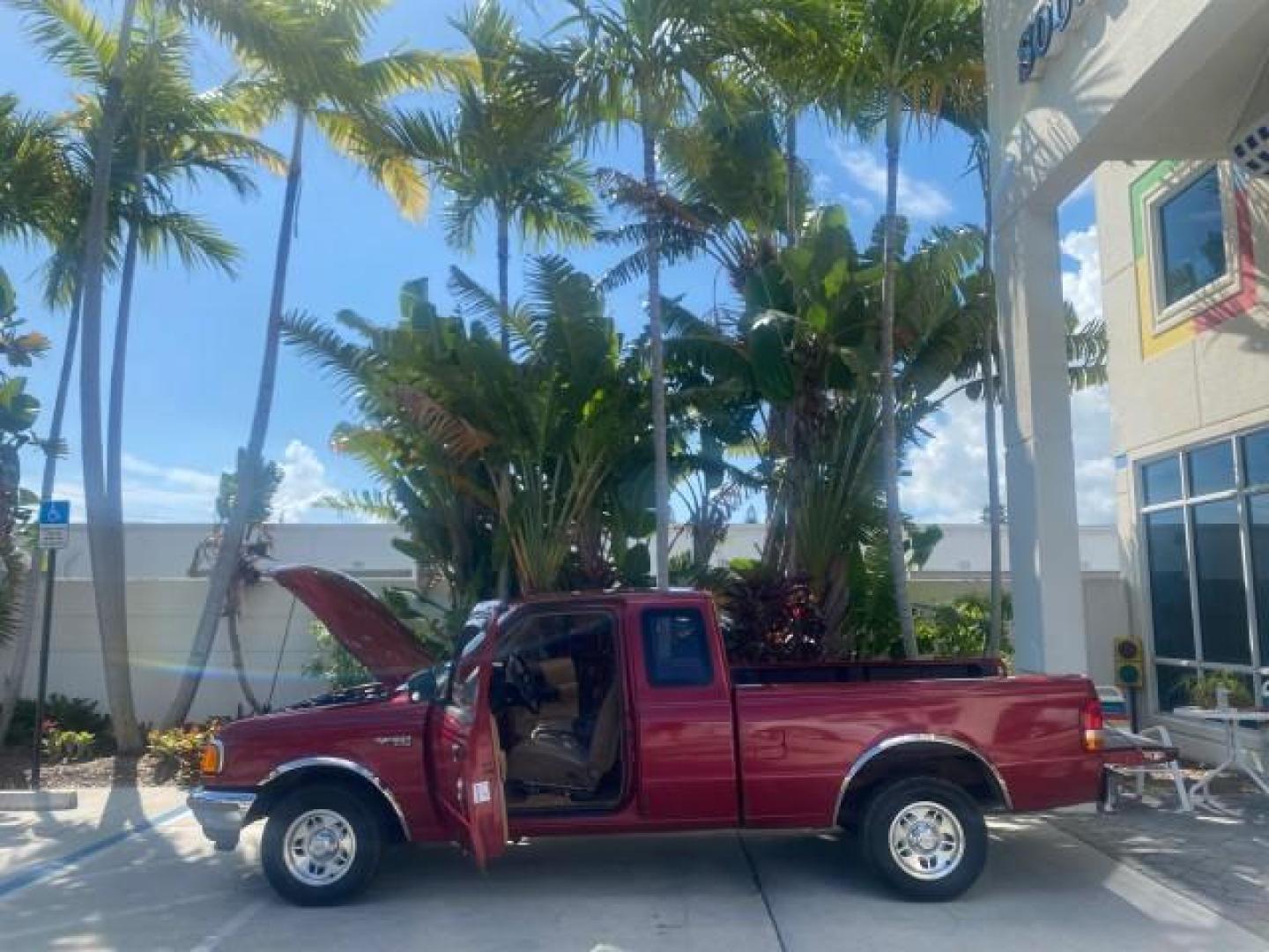 1995 Red /Tan Ford Ranger XLT EXTENDED CAB LOW MILES 64,867 (1FTCR14X7ST) with an 4.0L SPFI V6 Engine engine, Automatic transmission, located at 4701 North Dixie Hwy, Pompano Beach, FL, 33064, (954) 422-2889, 26.240938, -80.123474 - OUR WEBPAGE FLORIDACARS1.COM HAS OVER 100 PHOTOS AND FREE CARFAX LINK 1995 FORD RANGER SPLASH EXTENDED CAB - ICE COLD AC VIN: 1FTCR14X7STA40495 1 F T C R 1 4 X 7 S T A 4 0 4 9 5 CLUB CAB PICKUP 4.0L V6 F GASOLINE 29 MPG REAR WHEEL DRIVE Features ABS Brakes Air Conditioning Alloy Wheels AM/FM Stereo - Photo#8