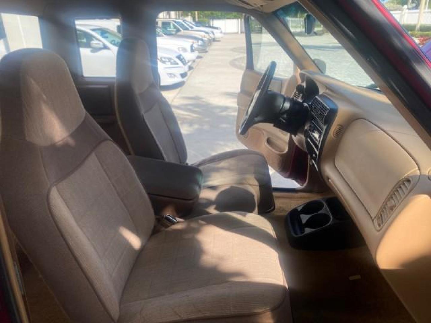 1995 Red /Tan Ford Ranger XLT EXTENDED CAB LOW MILES 64,867 (1FTCR14X7ST) with an 4.0L SPFI V6 Engine engine, Automatic transmission, located at 4701 North Dixie Hwy, Pompano Beach, FL, 33064, (954) 422-2889, 26.240938, -80.123474 - OUR WEBPAGE FLORIDACARS1.COM HAS OVER 100 PHOTOS AND FREE CARFAX LINK 1995 FORD RANGER SPLASH EXTENDED CAB - ICE COLD AC VIN: 1FTCR14X7STA40495 1 F T C R 1 4 X 7 S T A 4 0 4 9 5 CLUB CAB PICKUP 4.0L V6 F GASOLINE 29 MPG REAR WHEEL DRIVE Features ABS Brakes Air Conditioning Alloy Wheels AM/FM Stereo - Photo#12