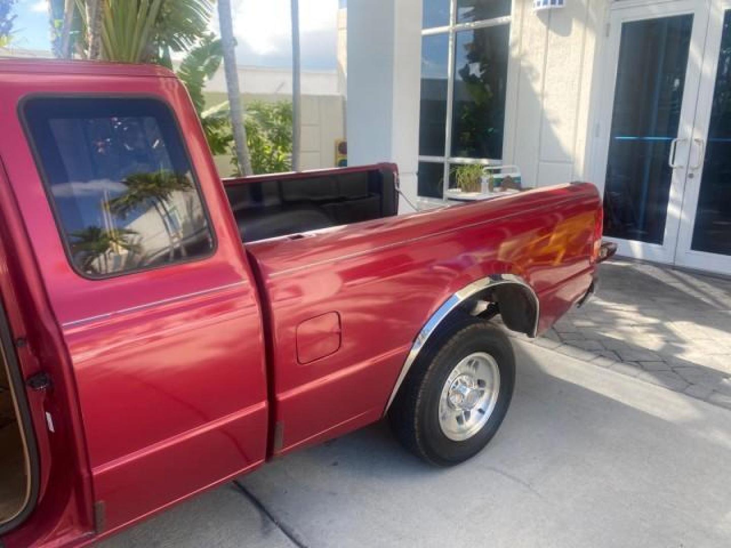 1995 Red /Tan Ford Ranger XLT EXTENDED CAB LOW MILES 64,867 (1FTCR14X7ST) with an 4.0L SPFI V6 Engine engine, Automatic transmission, located at 4701 North Dixie Hwy, Pompano Beach, FL, 33064, (954) 422-2889, 26.240938, -80.123474 - OUR WEBPAGE FLORIDACARS1.COM HAS OVER 100 PHOTOS AND FREE CARFAX LINK 1995 FORD RANGER SPLASH EXTENDED CAB - ICE COLD AC VIN: 1FTCR14X7STA40495 1 F T C R 1 4 X 7 S T A 4 0 4 9 5 CLUB CAB PICKUP 4.0L V6 F GASOLINE 29 MPG REAR WHEEL DRIVE Features ABS Brakes Air Conditioning Alloy Wheels AM/FM Stereo - Photo#13