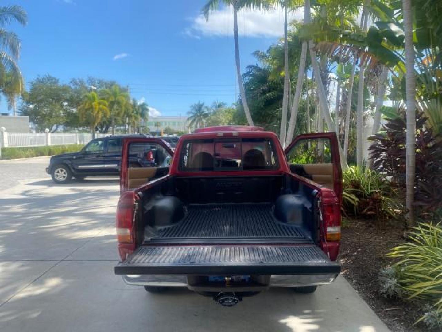 1995 Red /Tan Ford Ranger XLT EXTENDED CAB LOW MILES 64,867 (1FTCR14X7ST) with an 4.0L SPFI V6 Engine engine, Automatic transmission, located at 4701 North Dixie Hwy, Pompano Beach, FL, 33064, (954) 422-2889, 26.240938, -80.123474 - OUR WEBPAGE FLORIDACARS1.COM HAS OVER 100 PHOTOS AND FREE CARFAX LINK 1995 FORD RANGER SPLASH EXTENDED CAB - ICE COLD AC VIN: 1FTCR14X7STA40495 1 F T C R 1 4 X 7 S T A 4 0 4 9 5 CLUB CAB PICKUP 4.0L V6 F GASOLINE 29 MPG REAR WHEEL DRIVE Features ABS Brakes Air Conditioning Alloy Wheels AM/FM Stereo - Photo#15