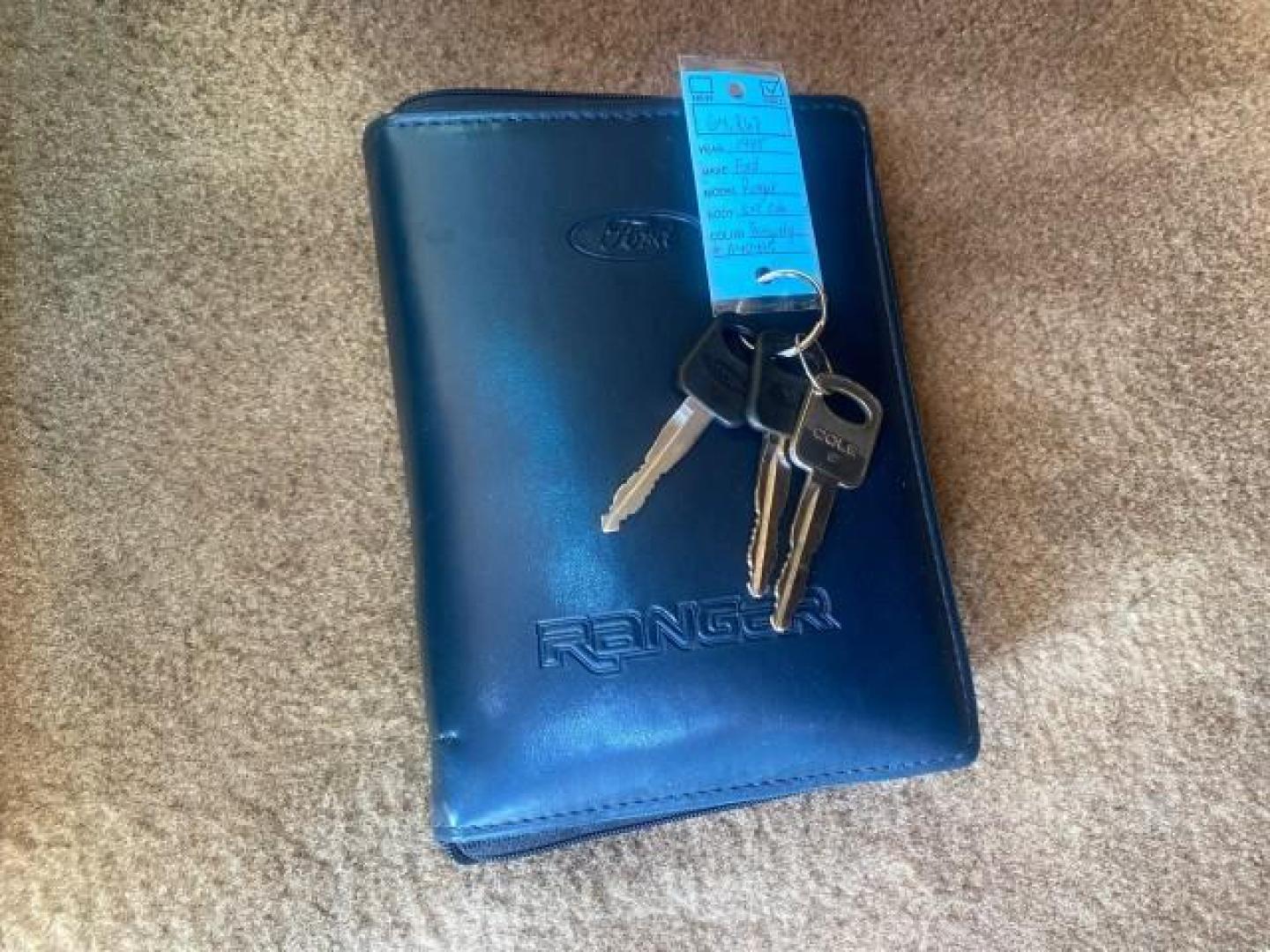 1995 Red /Tan Ford Ranger XLT EXTENDED CAB LOW MILES 64,867 (1FTCR14X7ST) with an 4.0L SPFI V6 Engine engine, Automatic transmission, located at 4701 North Dixie Hwy, Pompano Beach, FL, 33064, (954) 422-2889, 26.240938, -80.123474 - OUR WEBPAGE FLORIDACARS1.COM HAS OVER 100 PHOTOS AND FREE CARFAX LINK 1995 FORD RANGER SPLASH EXTENDED CAB - ICE COLD AC VIN: 1FTCR14X7STA40495 1 F T C R 1 4 X 7 S T A 4 0 4 9 5 CLUB CAB PICKUP 4.0L V6 F GASOLINE 29 MPG REAR WHEEL DRIVE Features ABS Brakes Air Conditioning Alloy Wheels AM/FM Stereo - Photo#23