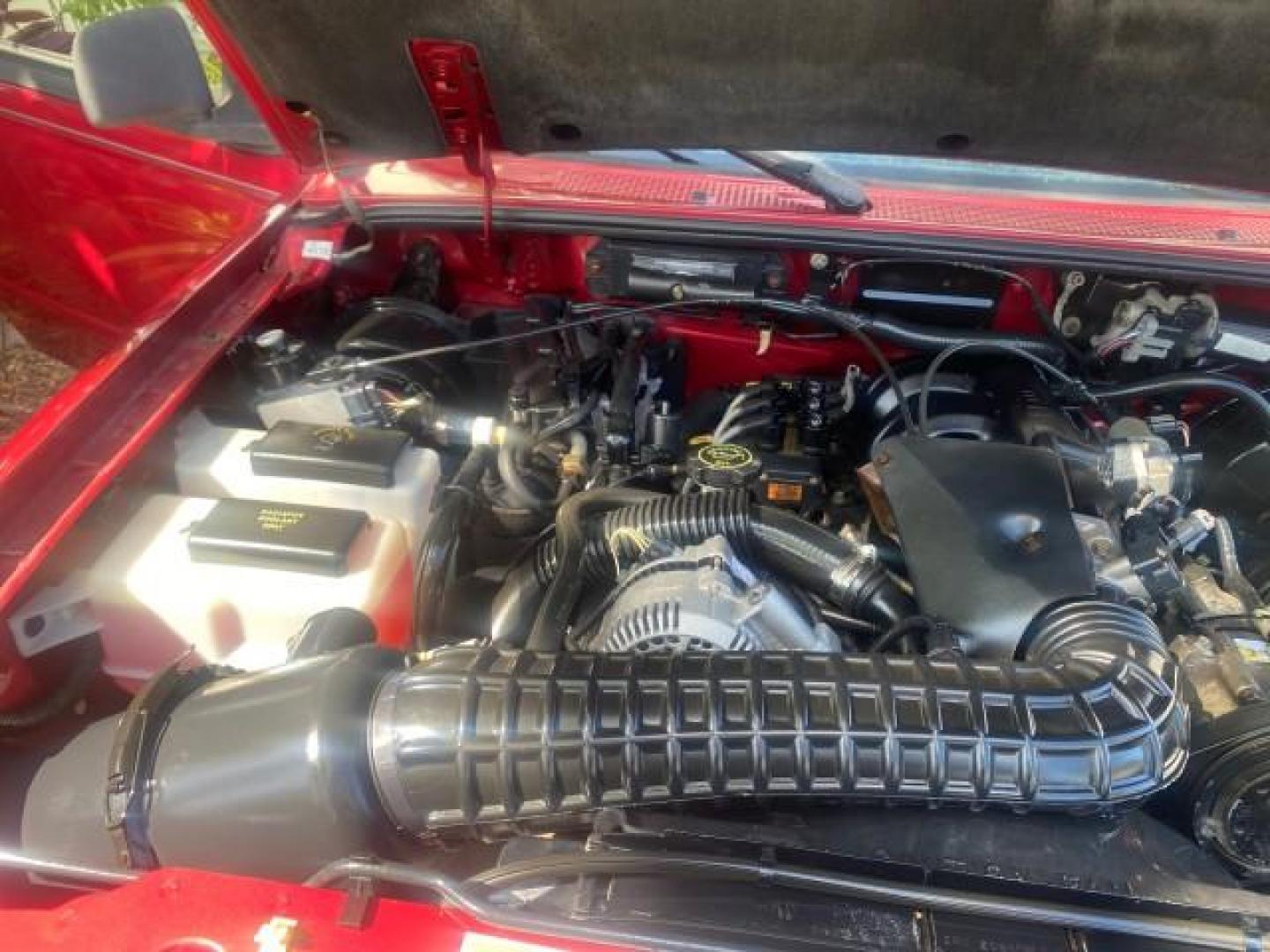 1995 Red /Tan Ford Ranger XLT EXTENDED CAB LOW MILES 64,867 (1FTCR14X7ST) with an 4.0L SPFI V6 Engine engine, Automatic transmission, located at 4701 North Dixie Hwy, Pompano Beach, FL, 33064, (954) 422-2889, 26.240938, -80.123474 - OUR WEBPAGE FLORIDACARS1.COM HAS OVER 100 PHOTOS AND FREE CARFAX LINK 1995 FORD RANGER SPLASH EXTENDED CAB - ICE COLD AC VIN: 1FTCR14X7STA40495 1 F T C R 1 4 X 7 S T A 4 0 4 9 5 CLUB CAB PICKUP 4.0L V6 F GASOLINE 29 MPG REAR WHEEL DRIVE Features ABS Brakes Air Conditioning Alloy Wheels AM/FM Stereo - Photo#25