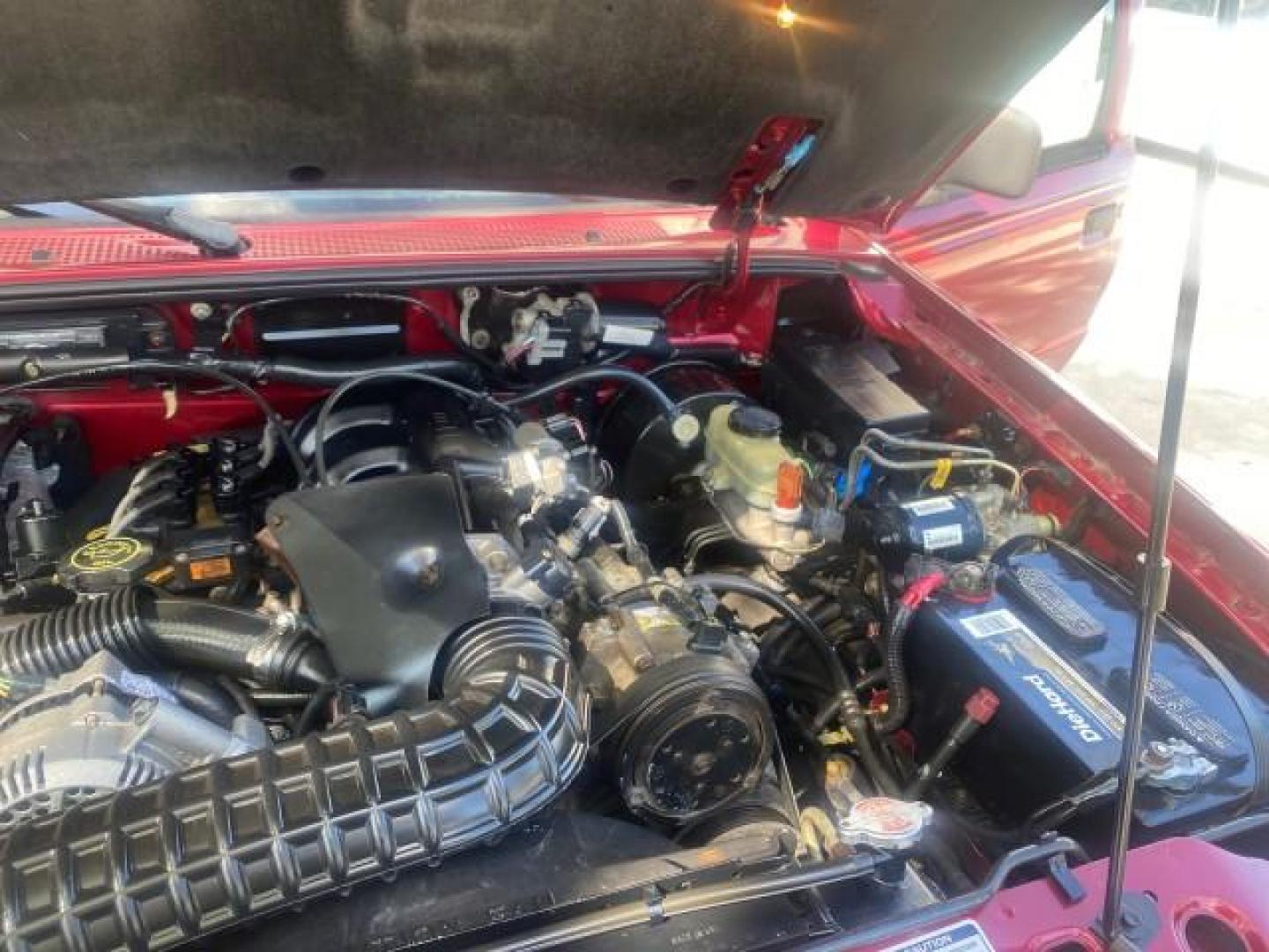 1995 Red /Tan Ford Ranger XLT EXTENDED CAB LOW MILES 64,867 (1FTCR14X7ST) with an 4.0L SPFI V6 Engine engine, Automatic transmission, located at 4701 North Dixie Hwy, Pompano Beach, FL, 33064, (954) 422-2889, 26.240938, -80.123474 - OUR WEBPAGE FLORIDACARS1.COM HAS OVER 100 PHOTOS AND FREE CARFAX LINK 1995 FORD RANGER SPLASH EXTENDED CAB - ICE COLD AC VIN: 1FTCR14X7STA40495 1 F T C R 1 4 X 7 S T A 4 0 4 9 5 CLUB CAB PICKUP 4.0L V6 F GASOLINE 29 MPG REAR WHEEL DRIVE Features ABS Brakes Air Conditioning Alloy Wheels AM/FM Stereo - Photo#26