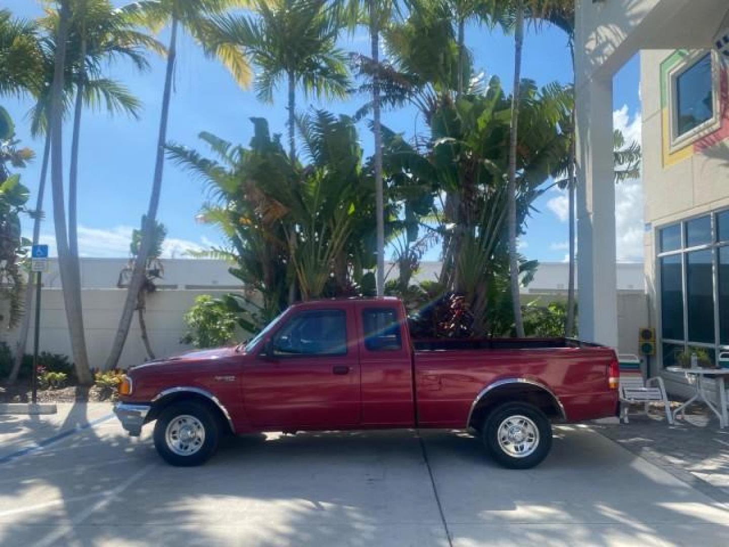 1995 Red /Tan Ford Ranger XLT EXTENDED CAB LOW MILES 64,867 (1FTCR14X7ST) with an 4.0L SPFI V6 Engine engine, Automatic transmission, located at 4701 North Dixie Hwy, Pompano Beach, FL, 33064, (954) 422-2889, 26.240938, -80.123474 - OUR WEBPAGE FLORIDACARS1.COM HAS OVER 100 PHOTOS AND FREE CARFAX LINK 1995 FORD RANGER SPLASH EXTENDED CAB - ICE COLD AC VIN: 1FTCR14X7STA40495 1 F T C R 1 4 X 7 S T A 4 0 4 9 5 CLUB CAB PICKUP 4.0L V6 F GASOLINE 29 MPG REAR WHEEL DRIVE Features ABS Brakes Air Conditioning Alloy Wheels AM/FM Stereo - Photo#31