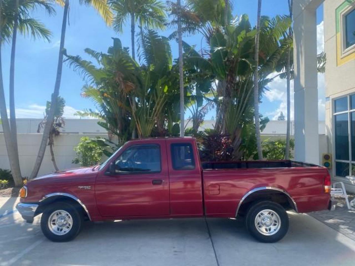 1995 Red /Tan Ford Ranger XLT EXTENDED CAB LOW MILES 64,867 (1FTCR14X7ST) with an 4.0L SPFI V6 Engine engine, Automatic transmission, located at 4701 North Dixie Hwy, Pompano Beach, FL, 33064, (954) 422-2889, 26.240938, -80.123474 - OUR WEBPAGE FLORIDACARS1.COM HAS OVER 100 PHOTOS AND FREE CARFAX LINK 1995 FORD RANGER SPLASH EXTENDED CAB - ICE COLD AC VIN: 1FTCR14X7STA40495 1 F T C R 1 4 X 7 S T A 4 0 4 9 5 CLUB CAB PICKUP 4.0L V6 F GASOLINE 29 MPG REAR WHEEL DRIVE Features ABS Brakes Air Conditioning Alloy Wheels AM/FM Stereo - Photo#32