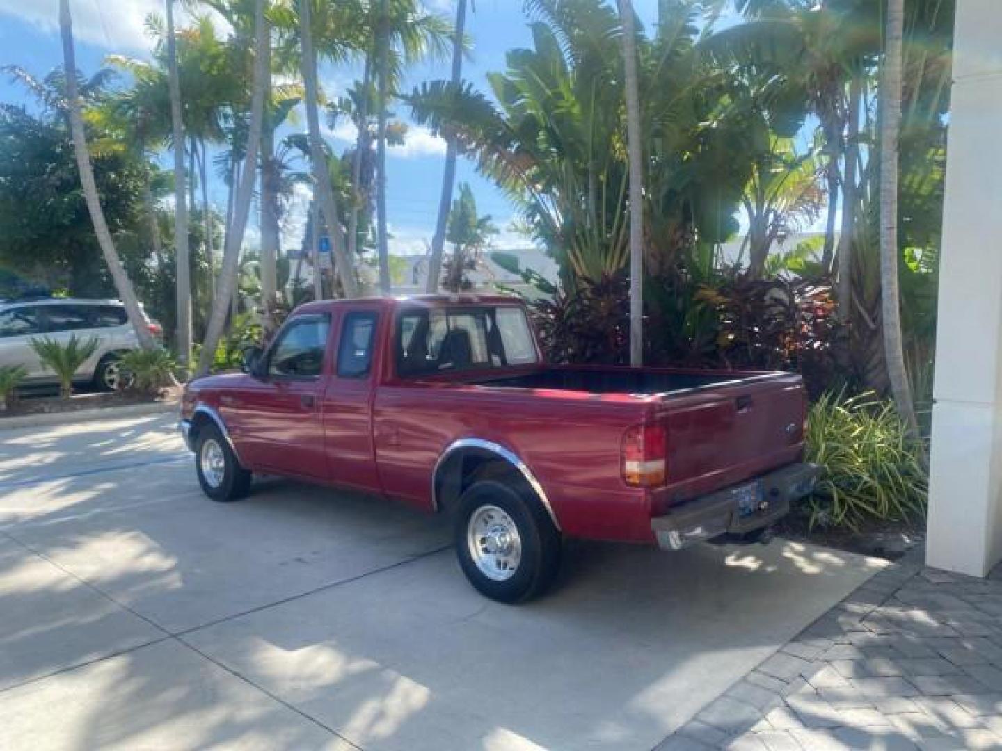 1995 Red /Tan Ford Ranger XLT EXTENDED CAB LOW MILES 64,867 (1FTCR14X7ST) with an 4.0L SPFI V6 Engine engine, Automatic transmission, located at 4701 North Dixie Hwy, Pompano Beach, FL, 33064, (954) 422-2889, 26.240938, -80.123474 - OUR WEBPAGE FLORIDACARS1.COM HAS OVER 100 PHOTOS AND FREE CARFAX LINK 1995 FORD RANGER SPLASH EXTENDED CAB - ICE COLD AC VIN: 1FTCR14X7STA40495 1 F T C R 1 4 X 7 S T A 4 0 4 9 5 CLUB CAB PICKUP 4.0L V6 F GASOLINE 29 MPG REAR WHEEL DRIVE Features ABS Brakes Air Conditioning Alloy Wheels AM/FM Stereo - Photo#33