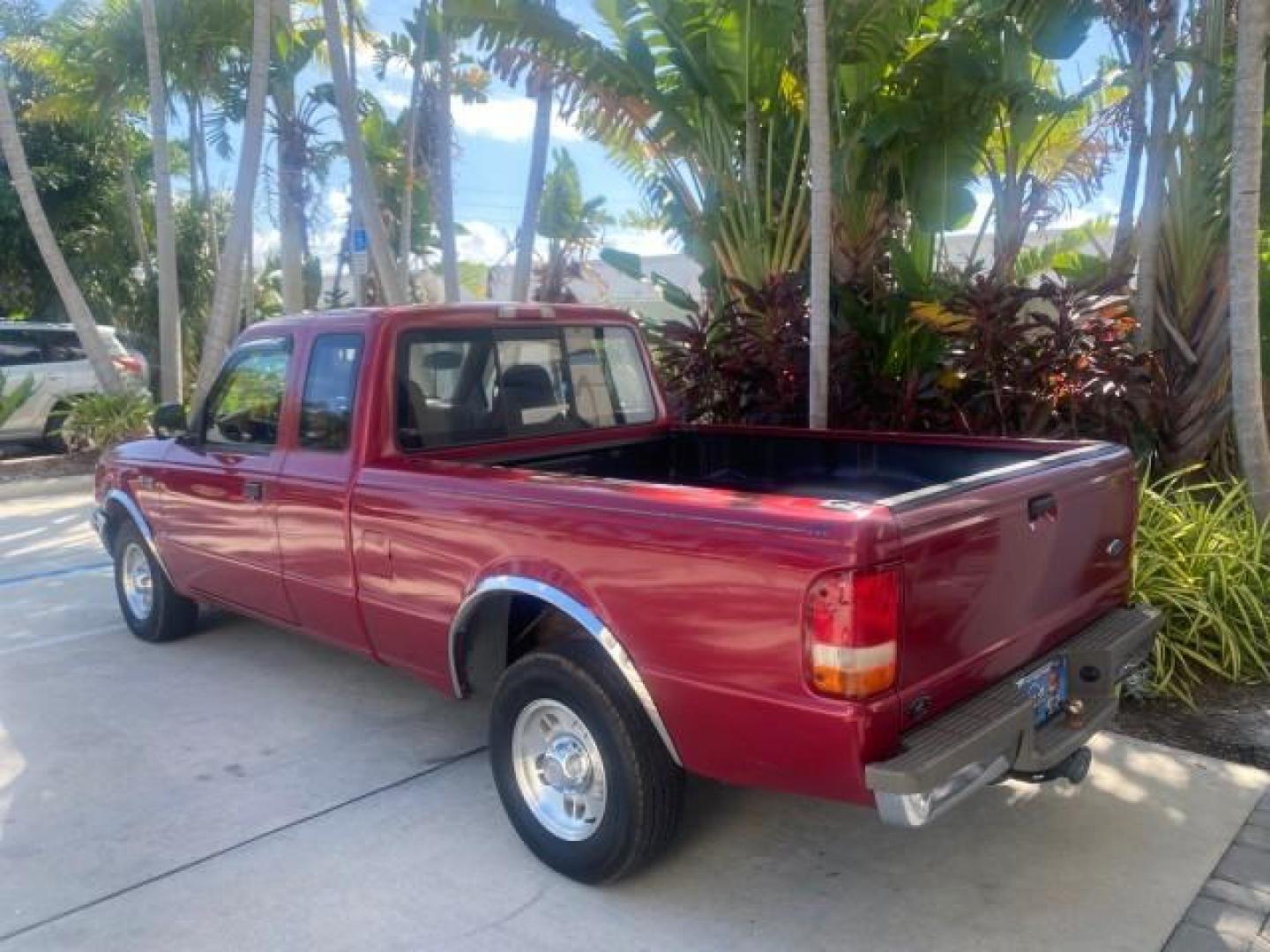 1995 Red /Tan Ford Ranger XLT EXTENDED CAB LOW MILES 64,867 (1FTCR14X7ST) with an 4.0L SPFI V6 Engine engine, Automatic transmission, located at 4701 North Dixie Hwy, Pompano Beach, FL, 33064, (954) 422-2889, 26.240938, -80.123474 - OUR WEBPAGE FLORIDACARS1.COM HAS OVER 100 PHOTOS AND FREE CARFAX LINK 1995 FORD RANGER SPLASH EXTENDED CAB - ICE COLD AC VIN: 1FTCR14X7STA40495 1 F T C R 1 4 X 7 S T A 4 0 4 9 5 CLUB CAB PICKUP 4.0L V6 F GASOLINE 29 MPG REAR WHEEL DRIVE Features ABS Brakes Air Conditioning Alloy Wheels AM/FM Stereo - Photo#34