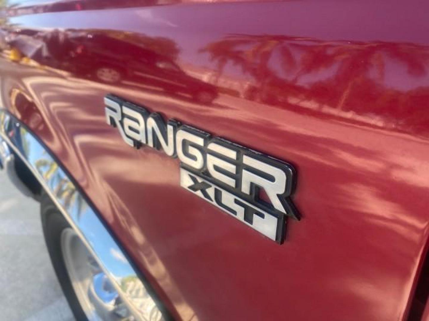 1995 Red /Tan Ford Ranger XLT EXTENDED CAB LOW MILES 64,867 (1FTCR14X7ST) with an 4.0L SPFI V6 Engine engine, Automatic transmission, located at 4701 North Dixie Hwy, Pompano Beach, FL, 33064, (954) 422-2889, 26.240938, -80.123474 - OUR WEBPAGE FLORIDACARS1.COM HAS OVER 100 PHOTOS AND FREE CARFAX LINK 1995 FORD RANGER SPLASH EXTENDED CAB - ICE COLD AC VIN: 1FTCR14X7STA40495 1 F T C R 1 4 X 7 S T A 4 0 4 9 5 CLUB CAB PICKUP 4.0L V6 F GASOLINE 29 MPG REAR WHEEL DRIVE Features ABS Brakes Air Conditioning Alloy Wheels AM/FM Stereo - Photo#42