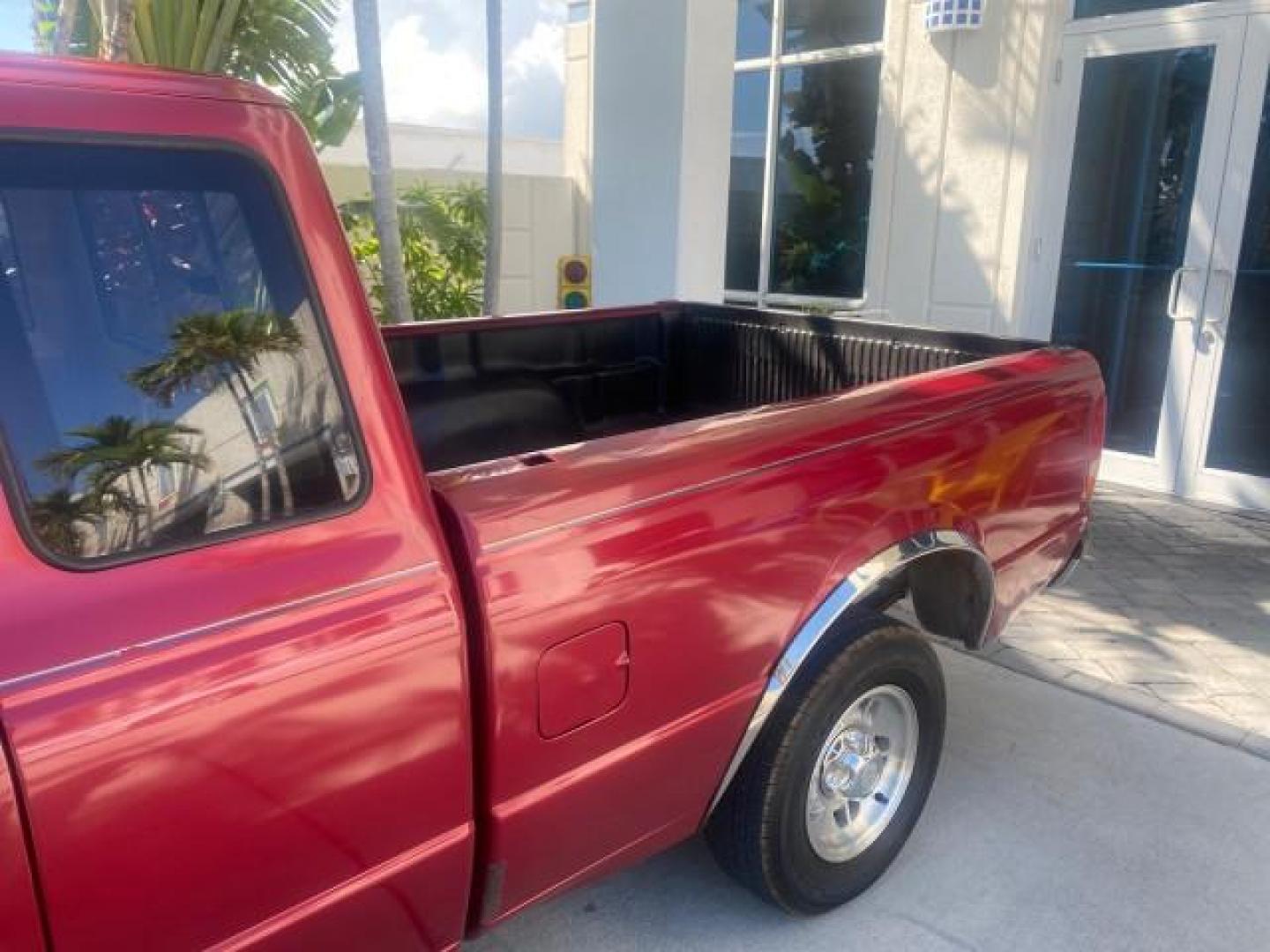 1995 Red /Tan Ford Ranger XLT EXTENDED CAB LOW MILES 64,867 (1FTCR14X7ST) with an 4.0L SPFI V6 Engine engine, Automatic transmission, located at 4701 North Dixie Hwy, Pompano Beach, FL, 33064, (954) 422-2889, 26.240938, -80.123474 - OUR WEBPAGE FLORIDACARS1.COM HAS OVER 100 PHOTOS AND FREE CARFAX LINK 1995 FORD RANGER SPLASH EXTENDED CAB - ICE COLD AC VIN: 1FTCR14X7STA40495 1 F T C R 1 4 X 7 S T A 4 0 4 9 5 CLUB CAB PICKUP 4.0L V6 F GASOLINE 29 MPG REAR WHEEL DRIVE Features ABS Brakes Air Conditioning Alloy Wheels AM/FM Stereo - Photo#69