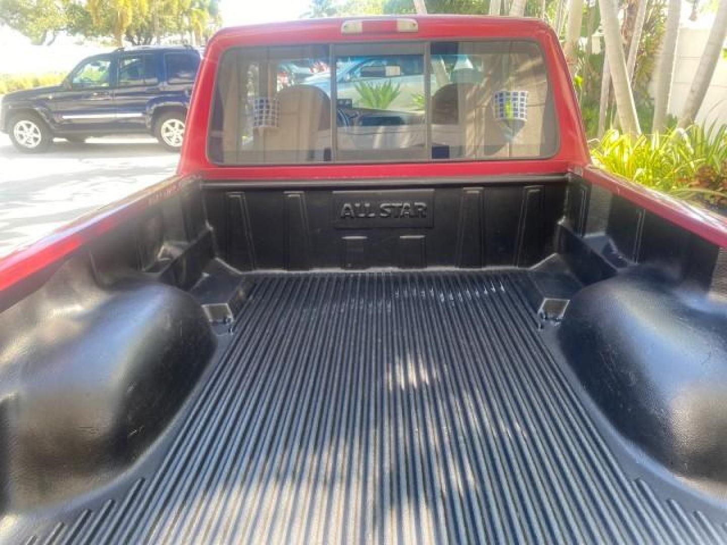 1995 Red /Tan Ford Ranger XLT EXTENDED CAB LOW MILES 64,867 (1FTCR14X7ST) with an 4.0L SPFI V6 Engine engine, Automatic transmission, located at 4701 North Dixie Hwy, Pompano Beach, FL, 33064, (954) 422-2889, 26.240938, -80.123474 - OUR WEBPAGE FLORIDACARS1.COM HAS OVER 100 PHOTOS AND FREE CARFAX LINK 1995 FORD RANGER SPLASH EXTENDED CAB - ICE COLD AC VIN: 1FTCR14X7STA40495 1 F T C R 1 4 X 7 S T A 4 0 4 9 5 CLUB CAB PICKUP 4.0L V6 F GASOLINE 29 MPG REAR WHEEL DRIVE Features ABS Brakes Air Conditioning Alloy Wheels AM/FM Stereo - Photo#77