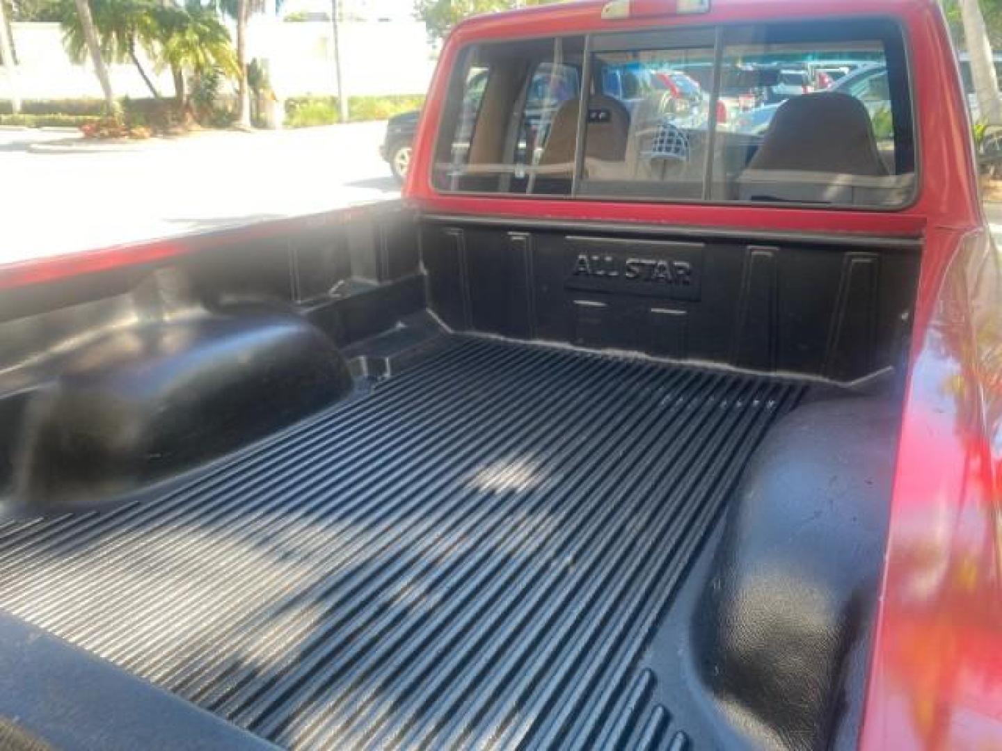 1995 Red /Tan Ford Ranger XLT EXTENDED CAB LOW MILES 64,867 (1FTCR14X7ST) with an 4.0L SPFI V6 Engine engine, Automatic transmission, located at 4701 North Dixie Hwy, Pompano Beach, FL, 33064, (954) 422-2889, 26.240938, -80.123474 - OUR WEBPAGE FLORIDACARS1.COM HAS OVER 100 PHOTOS AND FREE CARFAX LINK 1995 FORD RANGER SPLASH EXTENDED CAB - ICE COLD AC VIN: 1FTCR14X7STA40495 1 F T C R 1 4 X 7 S T A 4 0 4 9 5 CLUB CAB PICKUP 4.0L V6 F GASOLINE 29 MPG REAR WHEEL DRIVE Features ABS Brakes Air Conditioning Alloy Wheels AM/FM Stereo - Photo#78