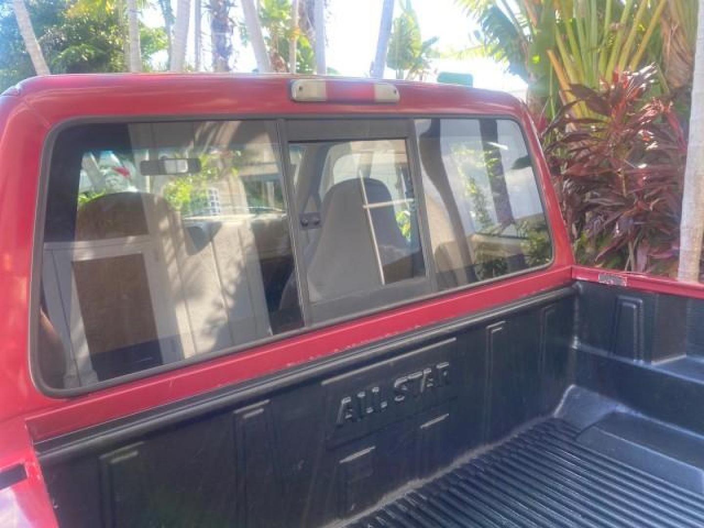 1995 Red /Tan Ford Ranger XLT EXTENDED CAB LOW MILES 64,867 (1FTCR14X7ST) with an 4.0L SPFI V6 Engine engine, Automatic transmission, located at 4701 North Dixie Hwy, Pompano Beach, FL, 33064, (954) 422-2889, 26.240938, -80.123474 - OUR WEBPAGE FLORIDACARS1.COM HAS OVER 100 PHOTOS AND FREE CARFAX LINK 1995 FORD RANGER SPLASH EXTENDED CAB - ICE COLD AC VIN: 1FTCR14X7STA40495 1 F T C R 1 4 X 7 S T A 4 0 4 9 5 CLUB CAB PICKUP 4.0L V6 F GASOLINE 29 MPG REAR WHEEL DRIVE Features ABS Brakes Air Conditioning Alloy Wheels AM/FM Stereo - Photo#79