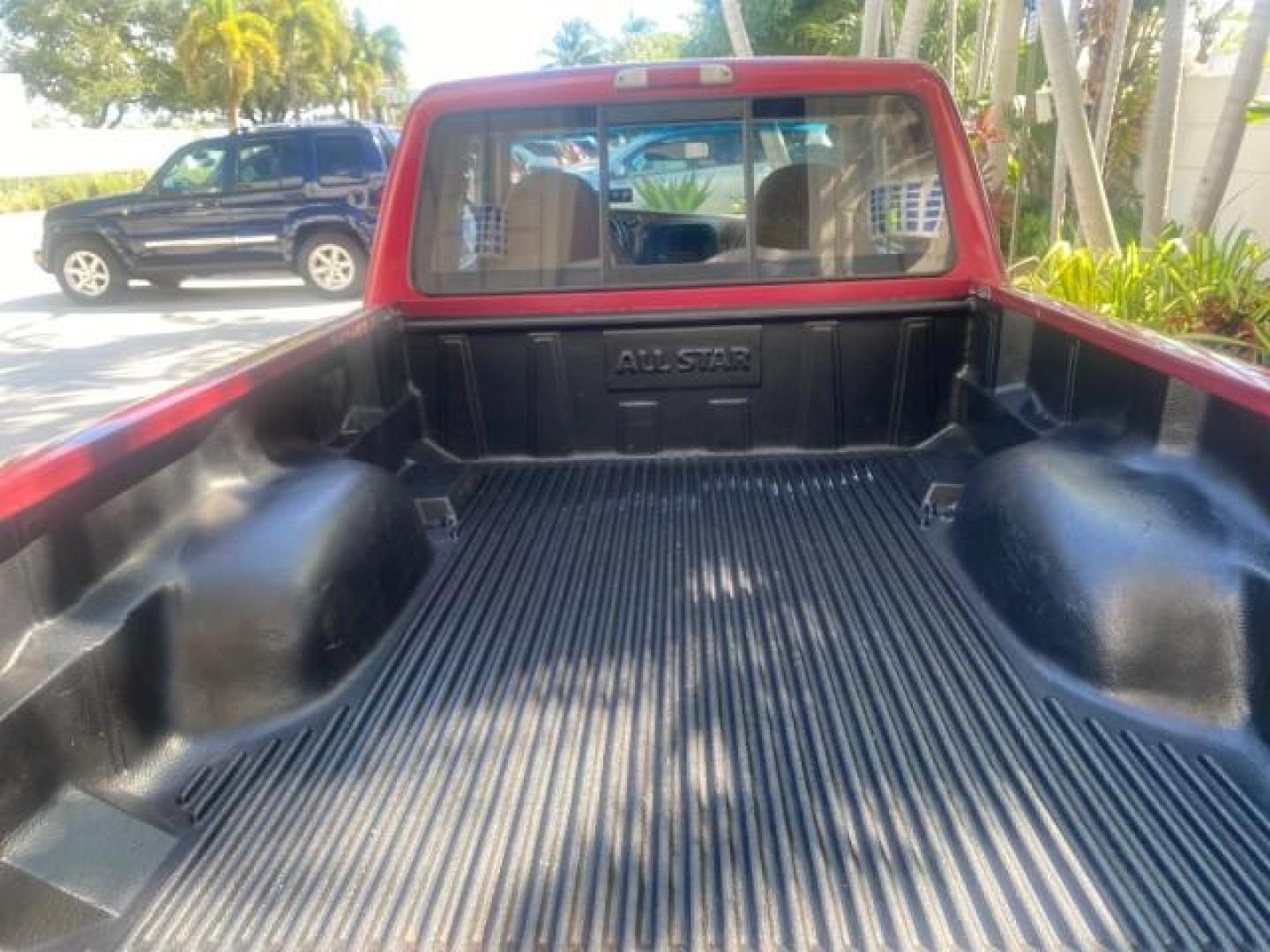 1995 Red /Tan Ford Ranger XLT EXTENDED CAB LOW MILES 64,867 (1FTCR14X7ST) with an 4.0L SPFI V6 Engine engine, Automatic transmission, located at 4701 North Dixie Hwy, Pompano Beach, FL, 33064, (954) 422-2889, 26.240938, -80.123474 - OUR WEBPAGE FLORIDACARS1.COM HAS OVER 100 PHOTOS AND FREE CARFAX LINK 1995 FORD RANGER SPLASH EXTENDED CAB - ICE COLD AC VIN: 1FTCR14X7STA40495 1 F T C R 1 4 X 7 S T A 4 0 4 9 5 CLUB CAB PICKUP 4.0L V6 F GASOLINE 29 MPG REAR WHEEL DRIVE Features ABS Brakes Air Conditioning Alloy Wheels AM/FM Stereo - Photo#83