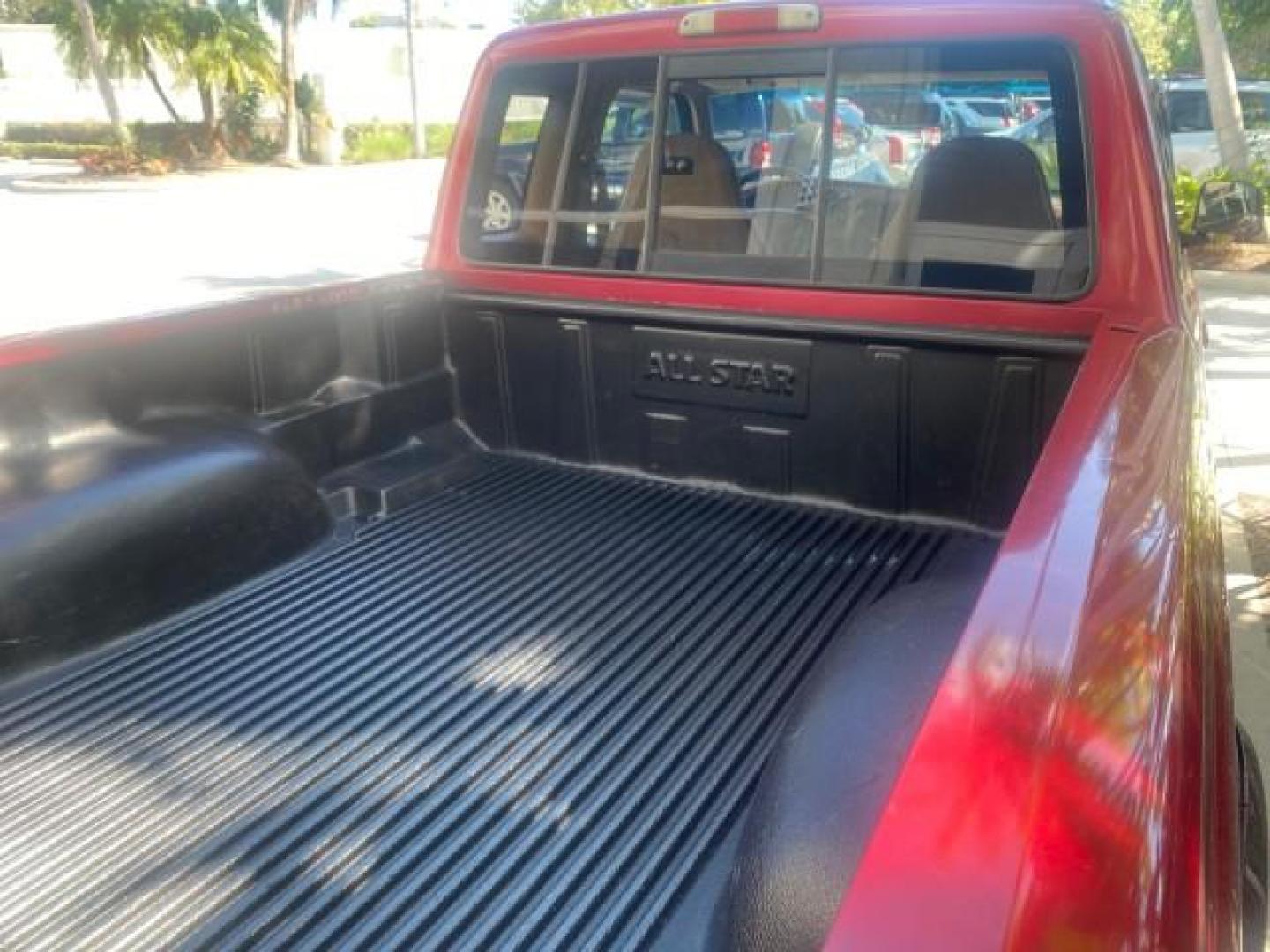 1995 Red /Tan Ford Ranger XLT EXTENDED CAB LOW MILES 64,867 (1FTCR14X7ST) with an 4.0L SPFI V6 Engine engine, Automatic transmission, located at 4701 North Dixie Hwy, Pompano Beach, FL, 33064, (954) 422-2889, 26.240938, -80.123474 - OUR WEBPAGE FLORIDACARS1.COM HAS OVER 100 PHOTOS AND FREE CARFAX LINK 1995 FORD RANGER SPLASH EXTENDED CAB - ICE COLD AC VIN: 1FTCR14X7STA40495 1 F T C R 1 4 X 7 S T A 4 0 4 9 5 CLUB CAB PICKUP 4.0L V6 F GASOLINE 29 MPG REAR WHEEL DRIVE Features ABS Brakes Air Conditioning Alloy Wheels AM/FM Stereo - Photo#84