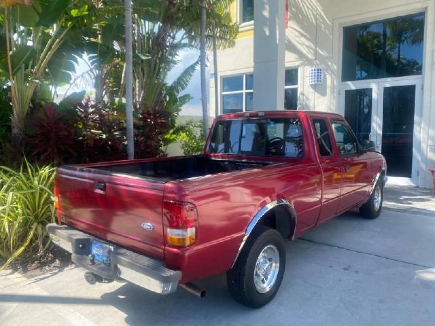 1995 Red /Tan Ford Ranger XLT EXTENDED CAB LOW MILES 64,867 (1FTCR14X7ST) with an 4.0L SPFI V6 Engine engine, Automatic transmission, located at 4701 North Dixie Hwy, Pompano Beach, FL, 33064, (954) 422-2889, 26.240938, -80.123474 - OUR WEBPAGE FLORIDACARS1.COM HAS OVER 100 PHOTOS AND FREE CARFAX LINK 1995 FORD RANGER SPLASH EXTENDED CAB - ICE COLD AC VIN: 1FTCR14X7STA40495 1 F T C R 1 4 X 7 S T A 4 0 4 9 5 CLUB CAB PICKUP 4.0L V6 F GASOLINE 29 MPG REAR WHEEL DRIVE Features ABS Brakes Air Conditioning Alloy Wheels AM/FM Stereo - Photo#90