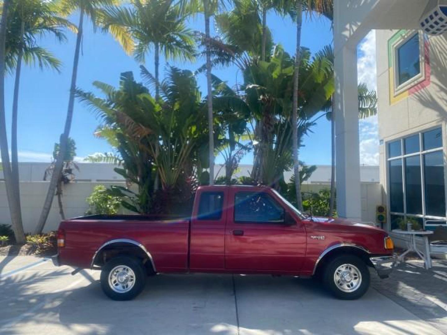 1995 Red /Tan Ford Ranger XLT EXTENDED CAB LOW MILES 64,867 (1FTCR14X7ST) with an 4.0L SPFI V6 Engine engine, Automatic transmission, located at 4701 North Dixie Hwy, Pompano Beach, FL, 33064, (954) 422-2889, 26.240938, -80.123474 - OUR WEBPAGE FLORIDACARS1.COM HAS OVER 100 PHOTOS AND FREE CARFAX LINK 1995 FORD RANGER SPLASH EXTENDED CAB - ICE COLD AC VIN: 1FTCR14X7STA40495 1 F T C R 1 4 X 7 S T A 4 0 4 9 5 CLUB CAB PICKUP 4.0L V6 F GASOLINE 29 MPG REAR WHEEL DRIVE Features ABS Brakes Air Conditioning Alloy Wheels AM/FM Stereo - Photo#91