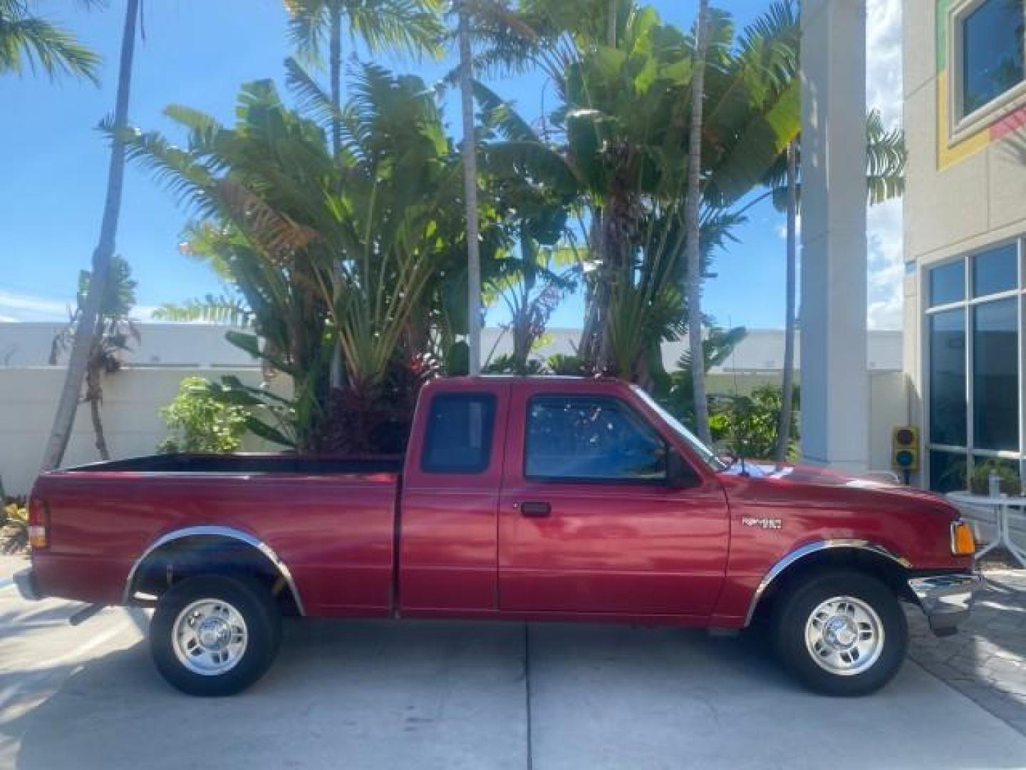 1995 Red /Tan Ford Ranger XLT EXTENDED CAB LOW MILES 64,867 (1FTCR14X7ST) with an 4.0L SPFI V6 Engine engine, Automatic transmission, located at 4701 North Dixie Hwy, Pompano Beach, FL, 33064, (954) 422-2889, 26.240938, -80.123474 - OUR WEBPAGE FLORIDACARS1.COM HAS OVER 100 PHOTOS AND FREE CARFAX LINK 1995 FORD RANGER SPLASH EXTENDED CAB - ICE COLD AC VIN: 1FTCR14X7STA40495 1 F T C R 1 4 X 7 S T A 4 0 4 9 5 CLUB CAB PICKUP 4.0L V6 F GASOLINE 29 MPG REAR WHEEL DRIVE Features ABS Brakes Air Conditioning Alloy Wheels AM/FM Stereo - Photo#92