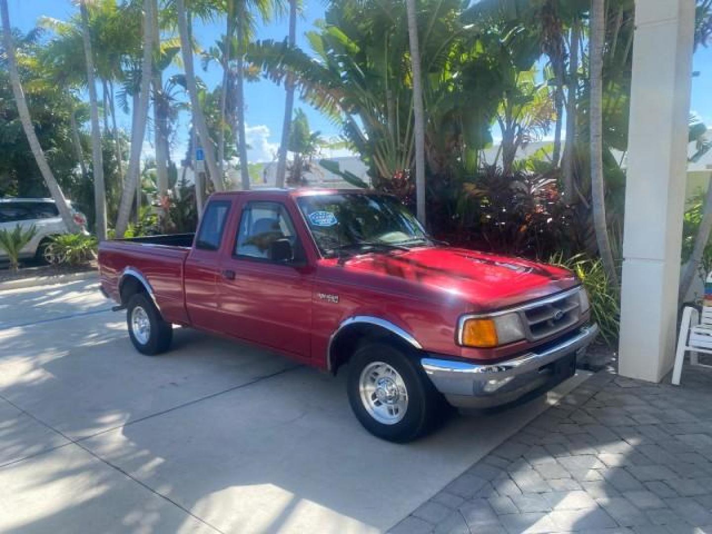 1995 Red /Tan Ford Ranger XLT EXTENDED CAB LOW MILES 64,867 (1FTCR14X7ST) with an 4.0L SPFI V6 Engine engine, Automatic transmission, located at 4701 North Dixie Hwy, Pompano Beach, FL, 33064, (954) 422-2889, 26.240938, -80.123474 - OUR WEBPAGE FLORIDACARS1.COM HAS OVER 100 PHOTOS AND FREE CARFAX LINK 1995 FORD RANGER SPLASH EXTENDED CAB - ICE COLD AC VIN: 1FTCR14X7STA40495 1 F T C R 1 4 X 7 S T A 4 0 4 9 5 CLUB CAB PICKUP 4.0L V6 F GASOLINE 29 MPG REAR WHEEL DRIVE Features ABS Brakes Air Conditioning Alloy Wheels AM/FM Stereo - Photo#93