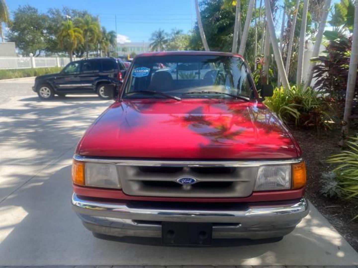 1995 Red /Tan Ford Ranger XLT EXTENDED CAB LOW MILES 64,867 (1FTCR14X7ST) with an 4.0L SPFI V6 Engine engine, Automatic transmission, located at 4701 North Dixie Hwy, Pompano Beach, FL, 33064, (954) 422-2889, 26.240938, -80.123474 - OUR WEBPAGE FLORIDACARS1.COM HAS OVER 100 PHOTOS AND FREE CARFAX LINK 1995 FORD RANGER SPLASH EXTENDED CAB - ICE COLD AC VIN: 1FTCR14X7STA40495 1 F T C R 1 4 X 7 S T A 4 0 4 9 5 CLUB CAB PICKUP 4.0L V6 F GASOLINE 29 MPG REAR WHEEL DRIVE Features ABS Brakes Air Conditioning Alloy Wheels AM/FM Stereo - Photo#95
