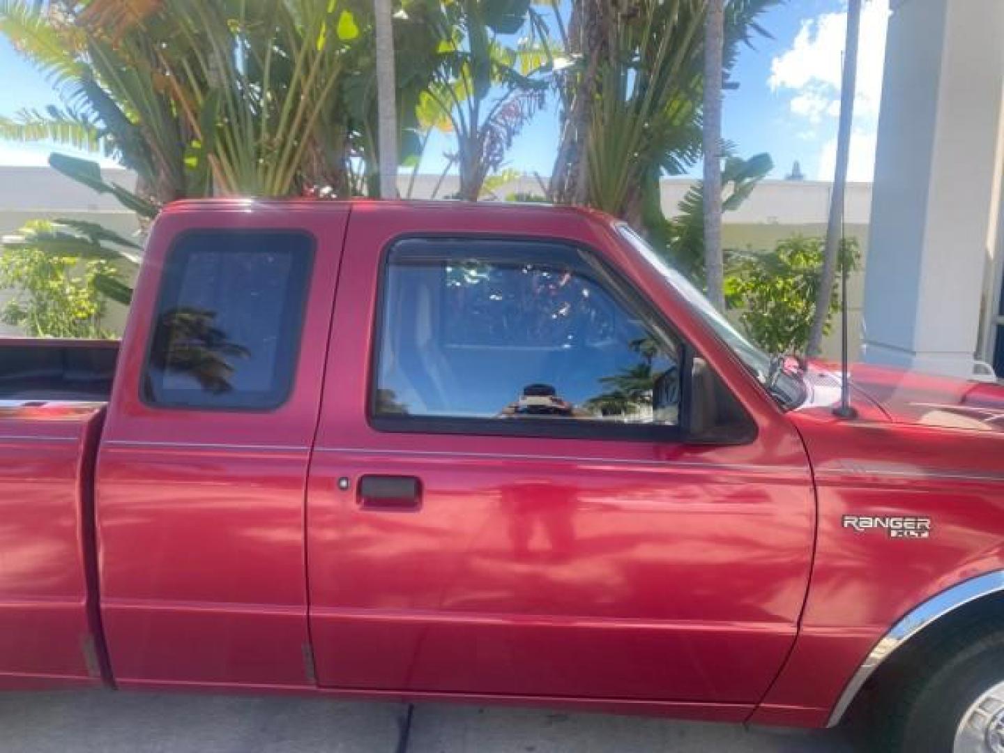 1995 Red /Tan Ford Ranger XLT EXTENDED CAB LOW MILES 64,867 (1FTCR14X7ST) with an 4.0L SPFI V6 Engine engine, Automatic transmission, located at 4701 North Dixie Hwy, Pompano Beach, FL, 33064, (954) 422-2889, 26.240938, -80.123474 - OUR WEBPAGE FLORIDACARS1.COM HAS OVER 100 PHOTOS AND FREE CARFAX LINK 1995 FORD RANGER SPLASH EXTENDED CAB - ICE COLD AC VIN: 1FTCR14X7STA40495 1 F T C R 1 4 X 7 S T A 4 0 4 9 5 CLUB CAB PICKUP 4.0L V6 F GASOLINE 29 MPG REAR WHEEL DRIVE Features ABS Brakes Air Conditioning Alloy Wheels AM/FM Stereo - Photo#99