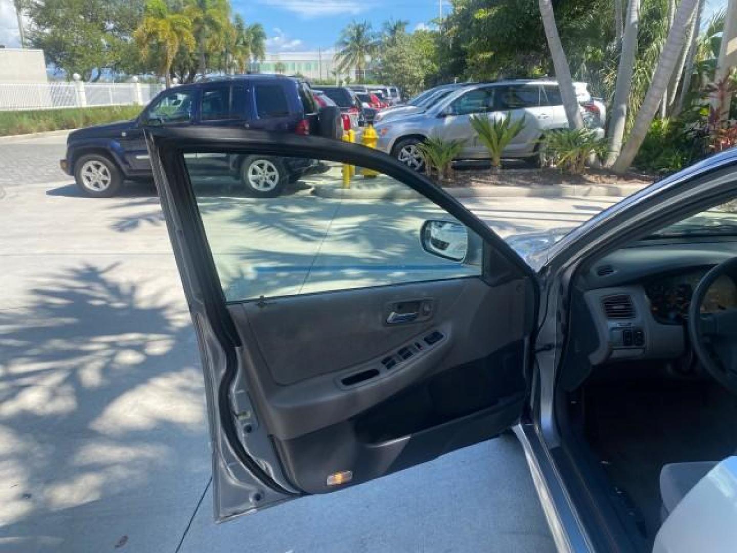2001 Satin Silver Metallic /Ivory Honda Accord Sdn EX LOW MILES 67,683 (JHMCG56601C) with an 2.3L 16-Valve VTEC I4 LEV-Certified Engine engine, Automatic transmission, located at 4701 North Dixie Hwy, Pompano Beach, FL, 33064, (954) 422-2889, 26.240938, -80.123474 - OUR WEBPAGE FLORIDACARS1.COM HAS OVER 100 PHOTOS AND FREE CARFAX LINK 2001 HONDA ACCORD EX VIN: JHMCG56601C020555 J H M C G 5 6 6 0 1 C 0 2 0 5 5 5 SEDAN 4 DR 2.3L I4 F OHV GASOLINE FRONT WHEEL DRIVE Features ABS Brakes Air Conditioning Alloy Wheels AM/FM Stereo Automatic Transmission Cassette Playe - Photo#9