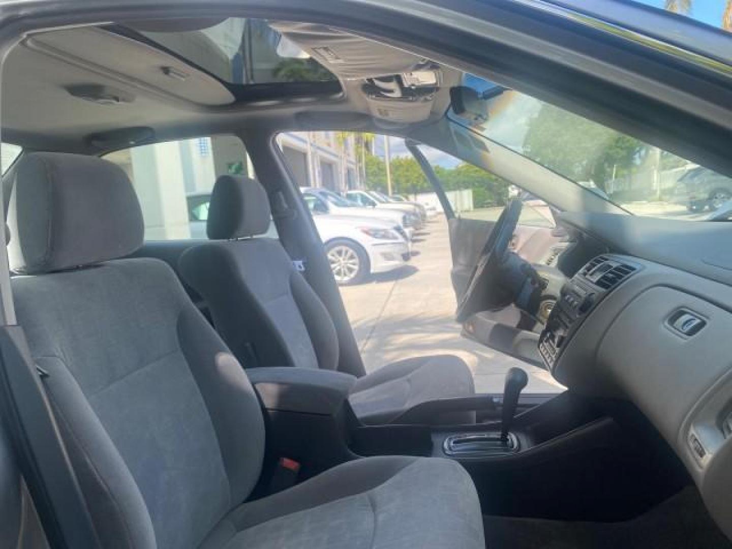 2001 Satin Silver Metallic /Ivory Honda Accord Sdn EX LOW MILES 67,683 (JHMCG56601C) with an 2.3L 16-Valve VTEC I4 LEV-Certified Engine engine, Automatic transmission, located at 4701 North Dixie Hwy, Pompano Beach, FL, 33064, (954) 422-2889, 26.240938, -80.123474 - OUR WEBPAGE FLORIDACARS1.COM HAS OVER 100 PHOTOS AND FREE CARFAX LINK 2001 HONDA ACCORD EX VIN: JHMCG56601C020555 J H M C G 5 6 6 0 1 C 0 2 0 5 5 5 SEDAN 4 DR 2.3L I4 F OHV GASOLINE FRONT WHEEL DRIVE Features ABS Brakes Air Conditioning Alloy Wheels AM/FM Stereo Automatic Transmission Cassette Playe - Photo#12