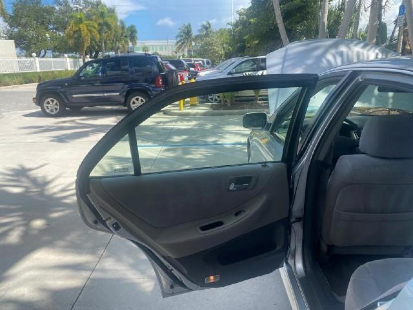 2001 Satin Silver Metallic /Ivory Honda Accord Sdn EX LOW MILES 67,683 (JHMCG56601C) with an 2.3L 16-Valve VTEC I4 LEV-Certified Engine engine, Automatic transmission, located at 4701 North Dixie Hwy, Pompano Beach, FL, 33064, (954) 422-2889, 26.240938, -80.123474 - OUR WEBPAGE FLORIDACARS1.COM HAS OVER 100 PHOTOS AND FREE CARFAX LINK 2001 HONDA ACCORD EX VIN: JHMCG56601C020555 J H M C G 5 6 6 0 1 C 0 2 0 5 5 5 SEDAN 4 DR 2.3L I4 F OHV GASOLINE FRONT WHEEL DRIVE Features ABS Brakes Air Conditioning Alloy Wheels AM/FM Stereo Automatic Transmission Cassette Playe - Photo#13