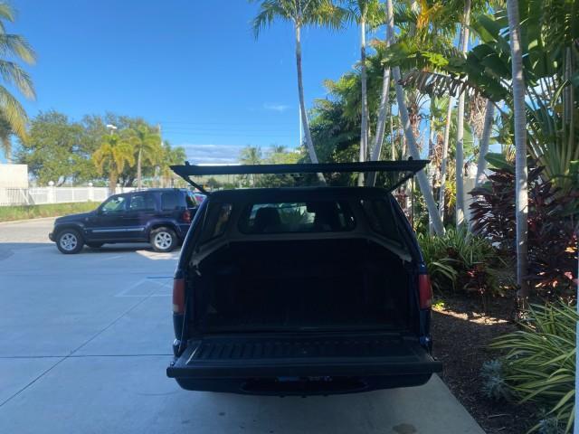 2001 Indigo Blue Metallic /Graphite GMC Sonoma X CAB SLS LOW MILES 70,869 (1GTCS19W618) with an 4.3L Vortec 1000 SFI V6 Engine engine, Automatic transmission, located at 4701 North Dixie Hwy, Pompano Beach, FL, 33064, (954) 422-2889, 26.240938, -80.123474 - OUR WEBPAGE FLORIDACARS1.COM HAS OVER 100 PHOTOS AND FREE CARFAX LINK 2001 GMC SONOMA SL EXTRACAB AUTO AC VIN: 1GTCS19W618237485 1 G T C S 1 9 W 6 1 8 2 3 7 4 8 5 CLUB CAB PICKUP 4.3L V6 F GASOLINE REAR WHEEL DRIVE Features ABS Brakes Air Conditioning Alloy Wheels AM/FM Stereo Automatic Transmission - Photo#80