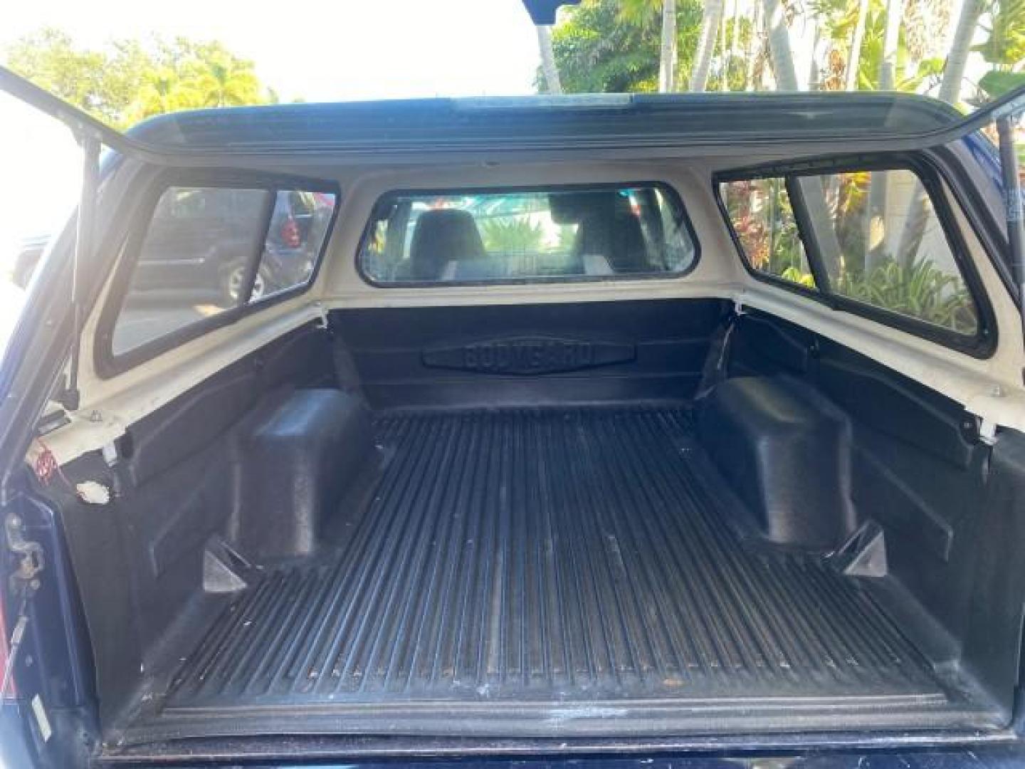 2001 Indigo Blue Metallic /Graphite GMC Sonoma X CAB SLS LOW MILES 70,869 (1GTCS19W618) with an 4.3L Vortec 1000 SFI V6 Engine engine, Automatic transmission, located at 4701 North Dixie Hwy, Pompano Beach, FL, 33064, (954) 422-2889, 26.240938, -80.123474 - OUR WEBPAGE FLORIDACARS1.COM HAS OVER 100 PHOTOS AND FREE CARFAX LINK 2001 GMC SONOMA SL EXTRACAB AUTO AC VIN: 1GTCS19W618237485 1 G T C S 1 9 W 6 1 8 2 3 7 4 8 5 CLUB CAB PICKUP 4.3L V6 F GASOLINE REAR WHEEL DRIVE Features ABS Brakes Air Conditioning Alloy Wheels AM/FM Stereo Automatic Transmission - Photo#82