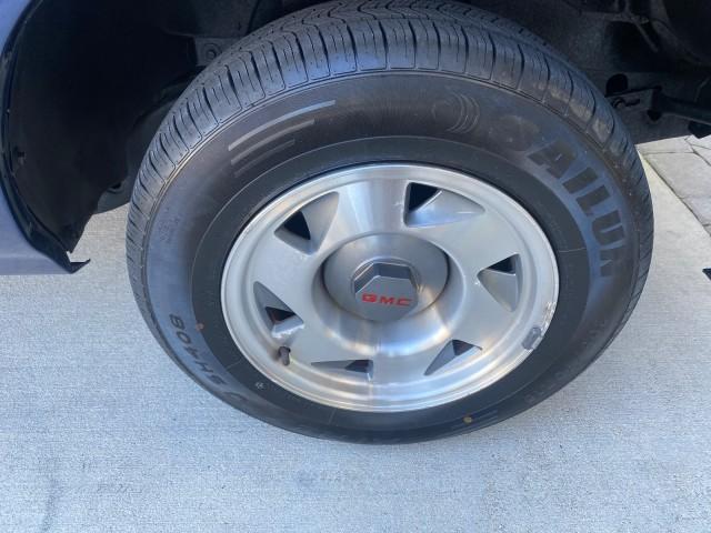 2001 Indigo Blue Metallic /Graphite GMC Sonoma X CAB SLS LOW MILES 70,869 (1GTCS19W618) with an 4.3L Vortec 1000 SFI V6 Engine engine, Automatic transmission, located at 4701 North Dixie Hwy, Pompano Beach, FL, 33064, (954) 422-2889, 26.240938, -80.123474 - OUR WEBPAGE FLORIDACARS1.COM HAS OVER 100 PHOTOS AND FREE CARFAX LINK 2001 GMC SONOMA SL EXTRACAB AUTO AC VIN: 1GTCS19W618237485 1 G T C S 1 9 W 6 1 8 2 3 7 4 8 5 CLUB CAB PICKUP 4.3L V6 F GASOLINE REAR WHEEL DRIVE Features ABS Brakes Air Conditioning Alloy Wheels AM/FM Stereo Automatic Transmission - Photo#97