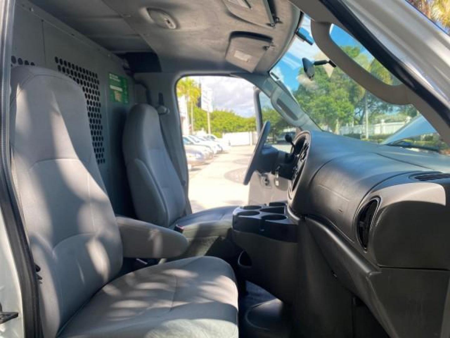 2008 Oxford White /Medium flint Ford Econoline Cargo Van CARGO VAN E250 LOW MILES 58,008 (1FTNE24W38D) with an 4.6L SOHC EFI V8 Triton Engine engine, Automatic transmission, located at 4701 North Dixie Hwy, Pompano Beach, FL, 33064, (954) 422-2889, 26.240938, -80.123474 - OUR WEBPAGE FLORIDACARS1.COM HAS OVER 100 PHOTOS AND FREE CARFAX LINK 2008 FORD E-SERIES E-250 VIN: 1FTNE24W38DB01913 1 F T N E 2 4 W 3 8 D B 0 1 9 1 3 VAN 4.6L V8 F SOHC 16V GASOLINE REAR WHEEL DRIVE Features ABS Brakes Air Conditioning AM/FM Stereo Automatic Transmission CD Audio Cruise Control Po - Photo#13