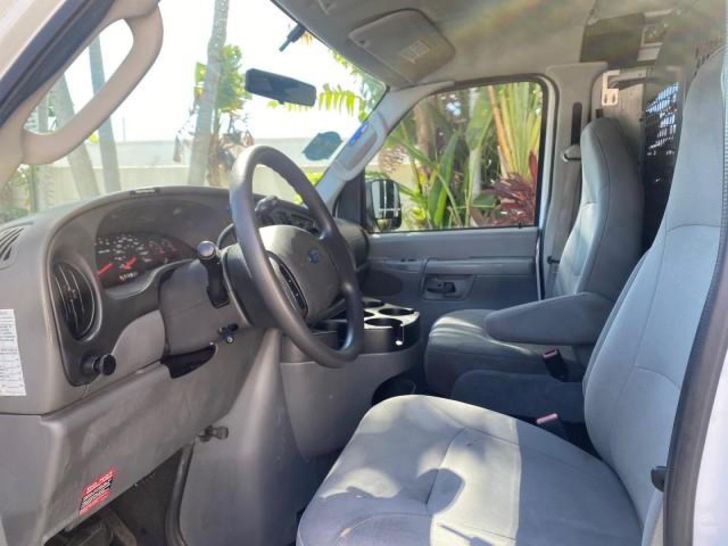 2008 Oxford White /Medium flint Ford Econoline Cargo Van CARGO VAN E250 LOW MILES 58,008 (1FTNE24W38D) with an 4.6L SOHC EFI V8 Triton Engine engine, Automatic transmission, located at 4701 North Dixie Hwy, Pompano Beach, FL, 33064, (954) 422-2889, 26.240938, -80.123474 - OUR WEBPAGE FLORIDACARS1.COM HAS OVER 100 PHOTOS AND FREE CARFAX LINK 2008 FORD E-SERIES E-250 VIN: 1FTNE24W38DB01913 1 F T N E 2 4 W 3 8 D B 0 1 9 1 3 VAN 4.6L V8 F SOHC 16V GASOLINE REAR WHEEL DRIVE Features ABS Brakes Air Conditioning AM/FM Stereo Automatic Transmission CD Audio Cruise Control Po - Photo#47