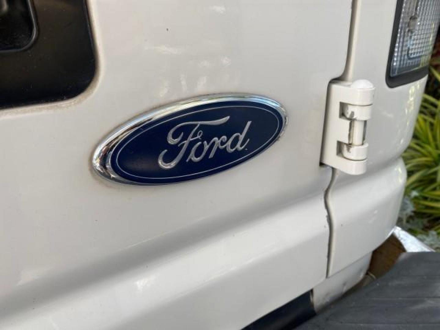 2008 Oxford White /Medium flint Ford Econoline Cargo Van CARGO VAN E250 LOW MILES 58,008 (1FTNE24W38D) with an 4.6L SOHC EFI V8 Triton Engine engine, Automatic transmission, located at 4701 North Dixie Hwy, Pompano Beach, FL, 33064, (954) 422-2889, 26.240938, -80.123474 - OUR WEBPAGE FLORIDACARS1.COM HAS OVER 100 PHOTOS AND FREE CARFAX LINK 2008 FORD E-SERIES E-250 VIN: 1FTNE24W38DB01913 1 F T N E 2 4 W 3 8 D B 0 1 9 1 3 VAN 4.6L V8 F SOHC 16V GASOLINE REAR WHEEL DRIVE Features ABS Brakes Air Conditioning AM/FM Stereo Automatic Transmission CD Audio Cruise Control Po - Photo#80