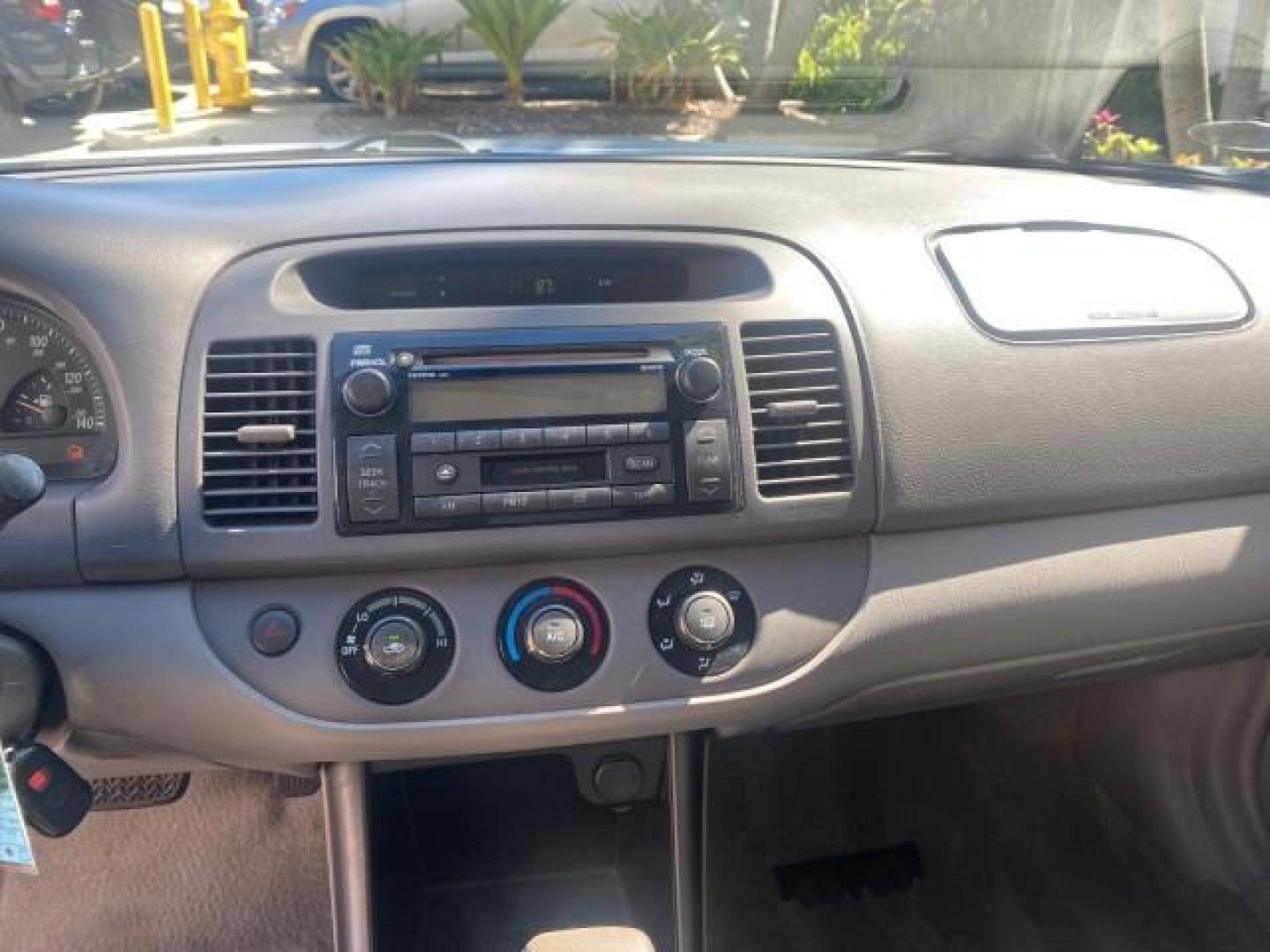 2002 Desert Sand Mica /Stone Toyota Camry LE LOW MILES 66,209 1 OWNER (4T1BE32K82U) with an 2.4L Twin-Cam EFI 16-Valve 4-Cyl Engine engine, Automatic transmission, located at 4701 North Dixie Hwy, Pompano Beach, FL, 33064, (954) 422-2889, 26.240938, -80.123474 - OUR WEBPAGE FLORIDACARS1.COM HAS OVER 100 PHOTOS AND FREE CARFAX LINK 2002 TOYOTA CAMRY LE AUTO ICE COLD AC VIN: 4T1BE32K82U112501 4 T 1 B E 3 2 K 8 2 U 1 1 2 5 0 1 SEDAN 4 DR 2.4L I4 F DOHC 16V GASOLINE 32 MPG FRONT WHEEL DRIVE Features ABS Brakes Air Conditioning AM/FM Stereo Automatic Transmissio - Photo#55