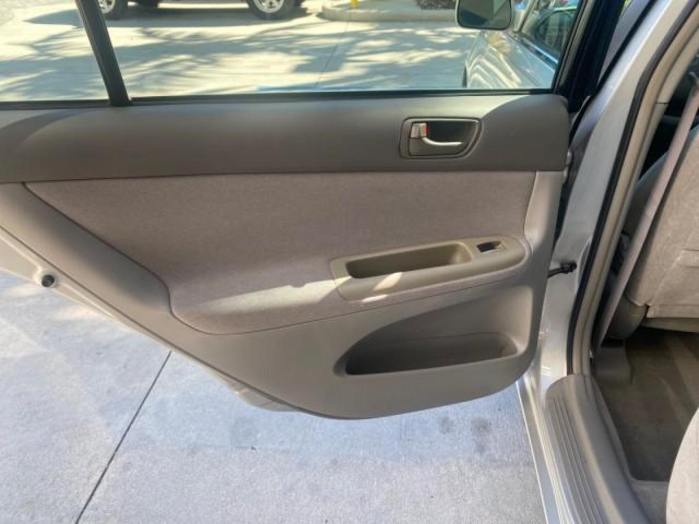 2002 Desert Sand Mica /Stone Toyota Camry LE LOW MILES 66,209 1 OWNER (4T1BE32K82U) with an 2.4L Twin-Cam EFI 16-Valve 4-Cyl Engine engine, Automatic transmission, located at 4701 North Dixie Hwy, Pompano Beach, FL, 33064, (954) 422-2889, 26.240938, -80.123474 - OUR WEBPAGE FLORIDACARS1.COM HAS OVER 100 PHOTOS AND FREE CARFAX LINK 2002 TOYOTA CAMRY LE AUTO ICE COLD AC VIN: 4T1BE32K82U112501 4 T 1 B E 3 2 K 8 2 U 1 1 2 5 0 1 SEDAN 4 DR 2.4L I4 F DOHC 16V GASOLINE 32 MPG FRONT WHEEL DRIVE Features ABS Brakes Air Conditioning AM/FM Stereo Automatic Transmissio - Photo#74