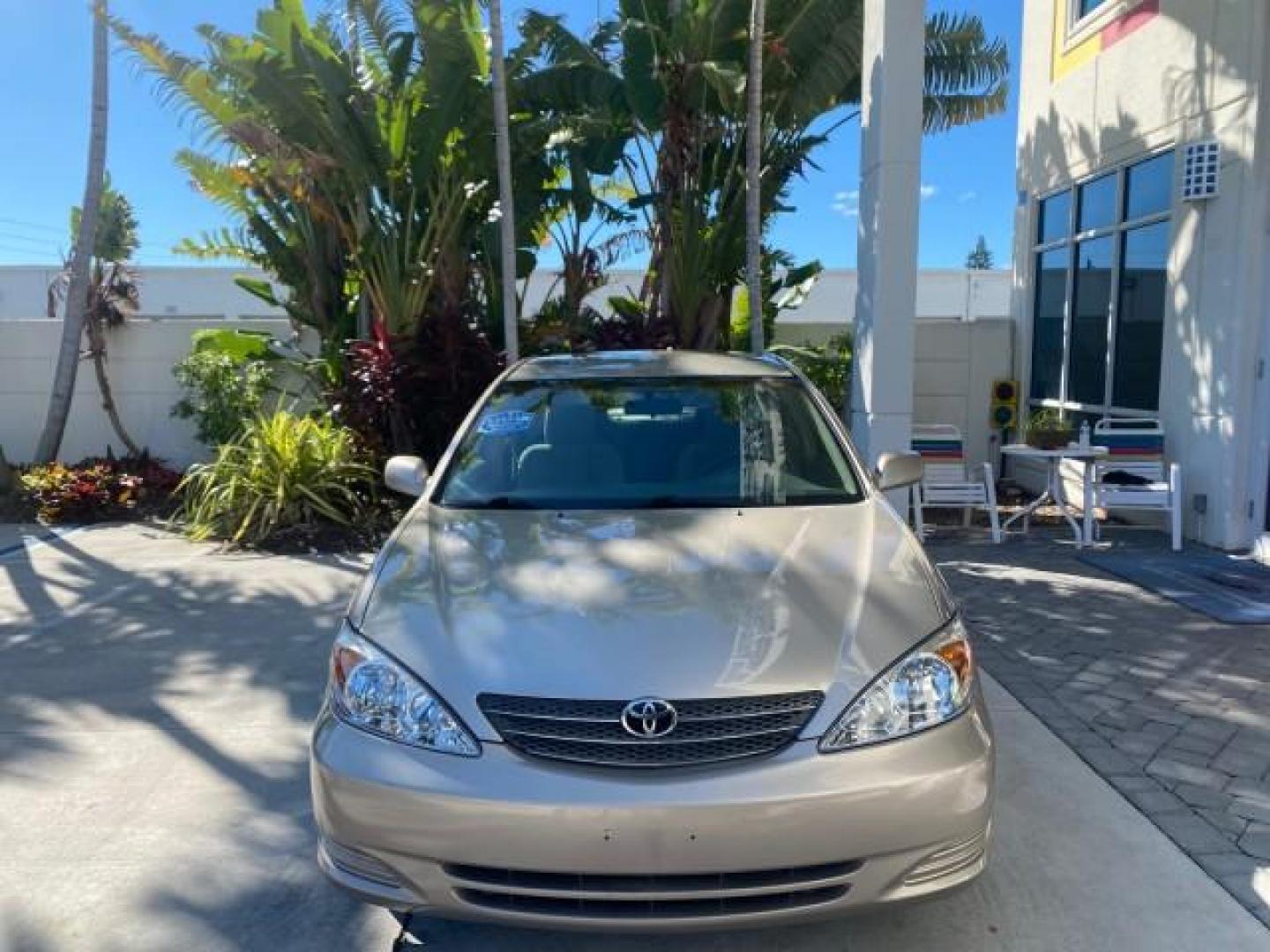 2004 Desert Sand Mica /Taupe Toyota Camry LE LOW MILES 25,414 ACTUAL (4T1BE32K04U) with an 2.4L DOHC MPFI Vvti 16-Valve 4-Cyl Engine engine, Automatic transmission, located at 4701 North Dixie Hwy, Pompano Beach, FL, 33064, (954) 422-2889, 26.240938, -80.123474 - OUR WEBPAGE FLORIDACARS1.COM HAS OVER 100 PHOTOS AND FREE CARFAX LINK 2004 TOYOTA CAMRY LE VIN: 4T1BE32K04U806344 4 T 1 B E 3 2 K 0 4 U 8 0 6 3 4 4 SEDAN 4 DR 2.4L I4 F DOHC 16V GASOLINE 32 MPG FRONT WHEEL DRIVE Features ABS Brakes Air Conditioning AM/FM Stereo Automatic Transmission Cassette Player - Photo#2